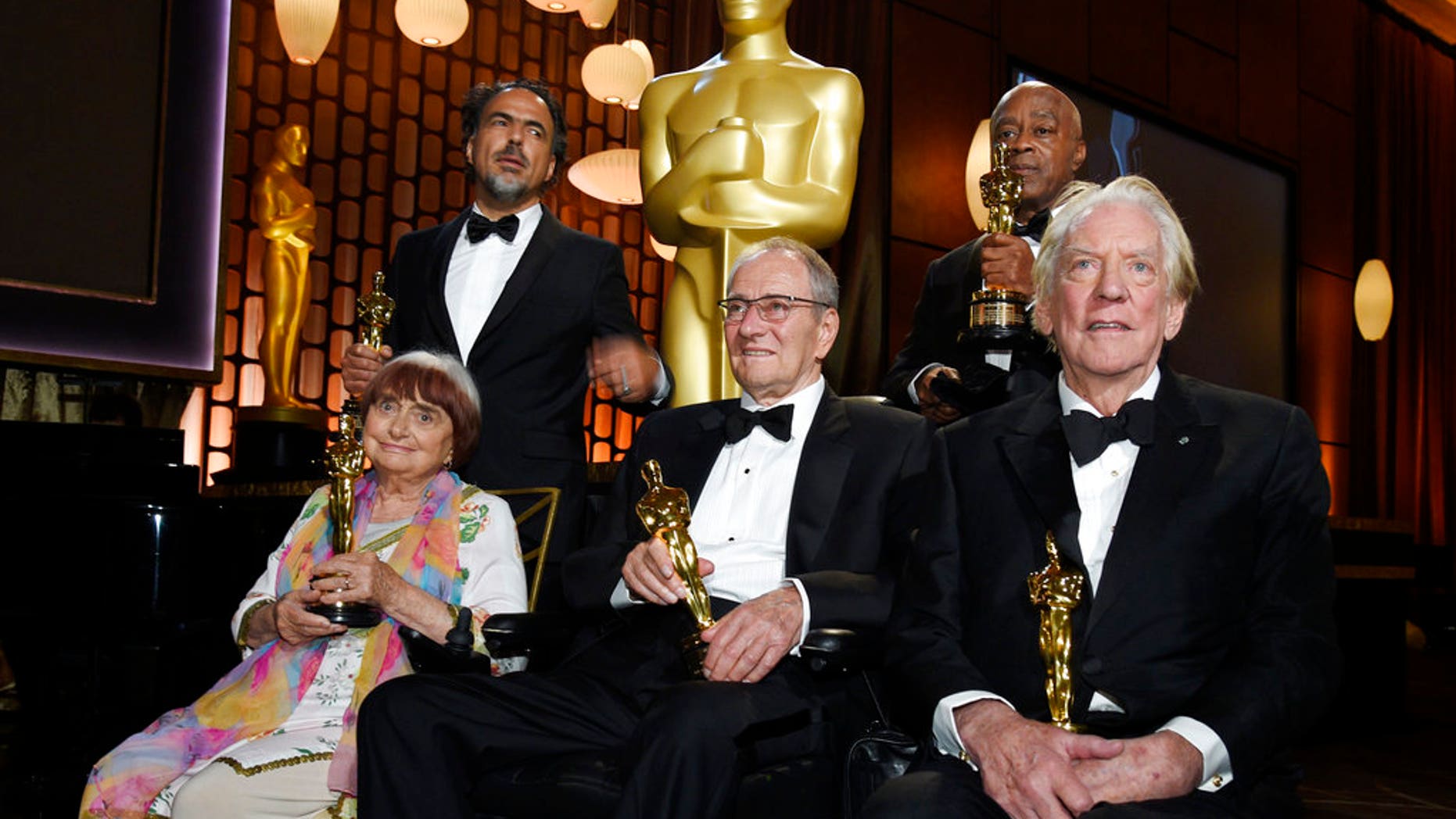 2017 Governors Awards honorees Agnes Varda, Alejandro Gonzales Inarritu, Owen Roizman, Charles Burnett and Donald Sutherland pose with their Oscars following a ceremony at The Ray Dolby Ballroom