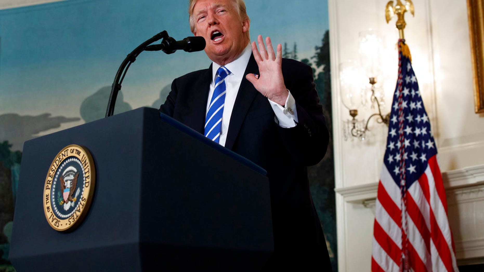 President Donald Trump speaks in the Diplomatic Reception Room of the White House, Wednesday, Nov. 15, 2017, in Washington. (AP Photo/Evan Vucci)