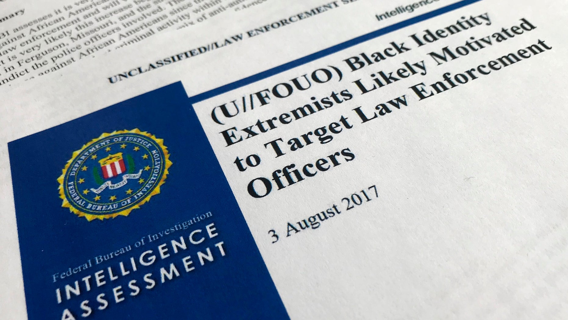In this Nov. 17, 2017, photo, the cover page of a FBI report on the rise of black âextremistsâ is photographed in Washington. The report is stirring fears of a return to practices of the Civil Rights era, when the agency notoriously spied on activist groups without evidence they had broken any laws. Attorney General Jeff Sessions, a former Alabama senator whose career has been dogged by questions about race and his commitment to civil rights, did not ease lawmakersâ concerns when he was unable to answer questions about the report or its origins during a congressional hearing on Nov. 14. (AP Photo/Jon Elswick)