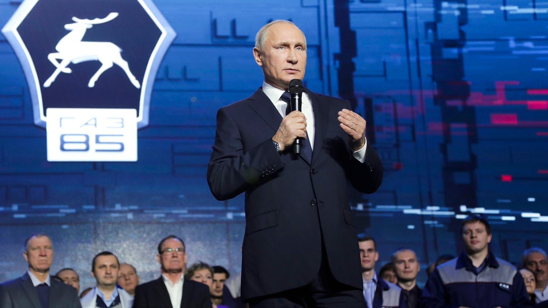 Russian President Vladimir Putin speaks at a meeting with workers of the GAZ factory in Nizhny Novgorod, Russia, Wednesday, Dec. 6, 2017. Putin says he will seek re-election in next March's election