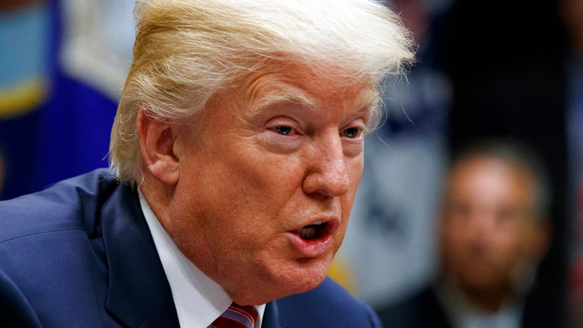 FILE - In this Tuesday, Oct. 31, 2017 photo, President Donald Trump speaks during a meeting in the Roosevelt Room of the White House in Washington.