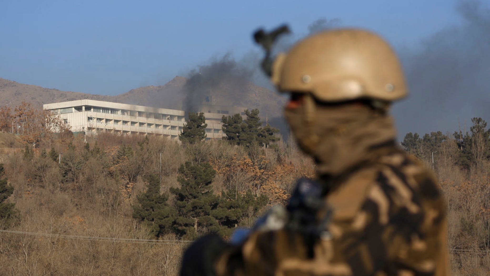 Black smoke rises from the Intercontinental Hotel after an attack in Kabul, Afghanistan, Jan. 21, 2018.