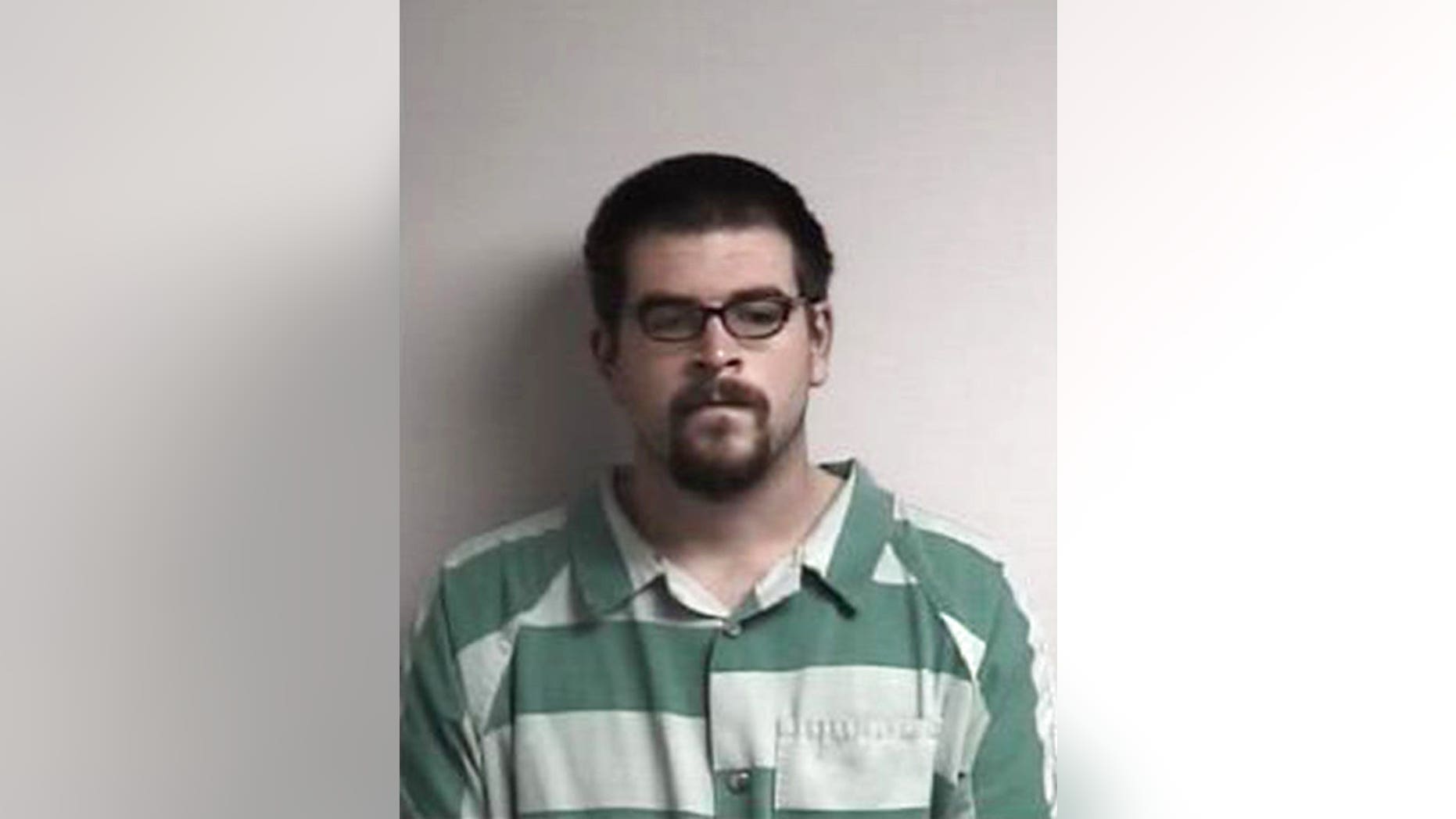Bradley Hardison, 27, a doughnut-eating contest winner, was arrested for allegedly stealing from a Dunkin' Donuts.