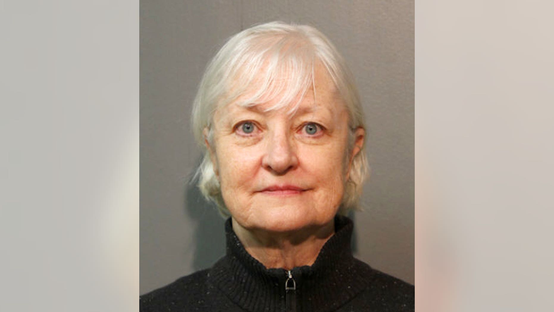 In this Jan. 2018, photo provided by the Chicago Police Department, Marilyn Hartman is seen posing for a mugshot in Chicago. (Chicago Police Department via AP)