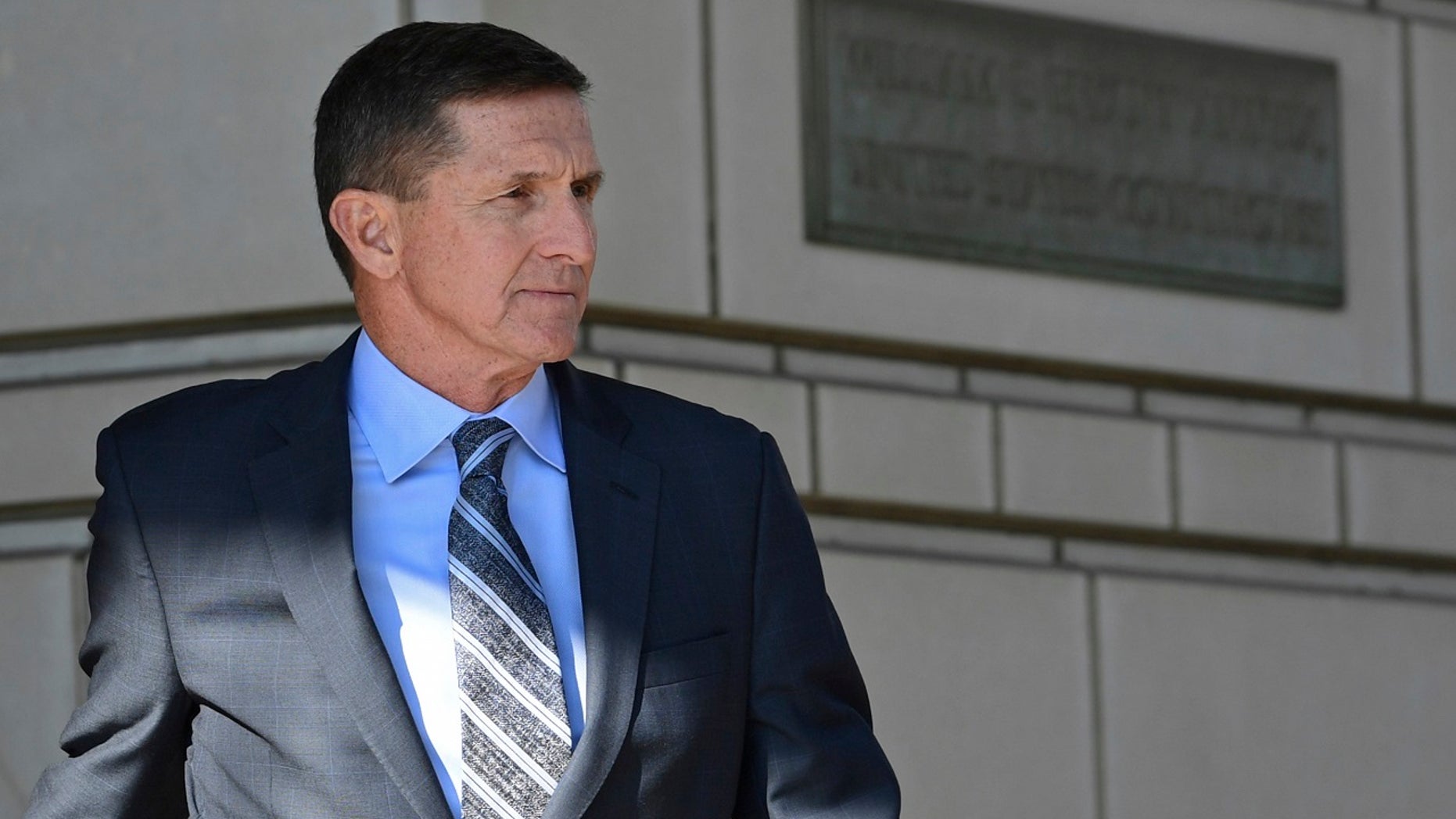 Former Trump national security adviser Michael Flynn leaves federal court in Washington, Dec. 1, 2017.