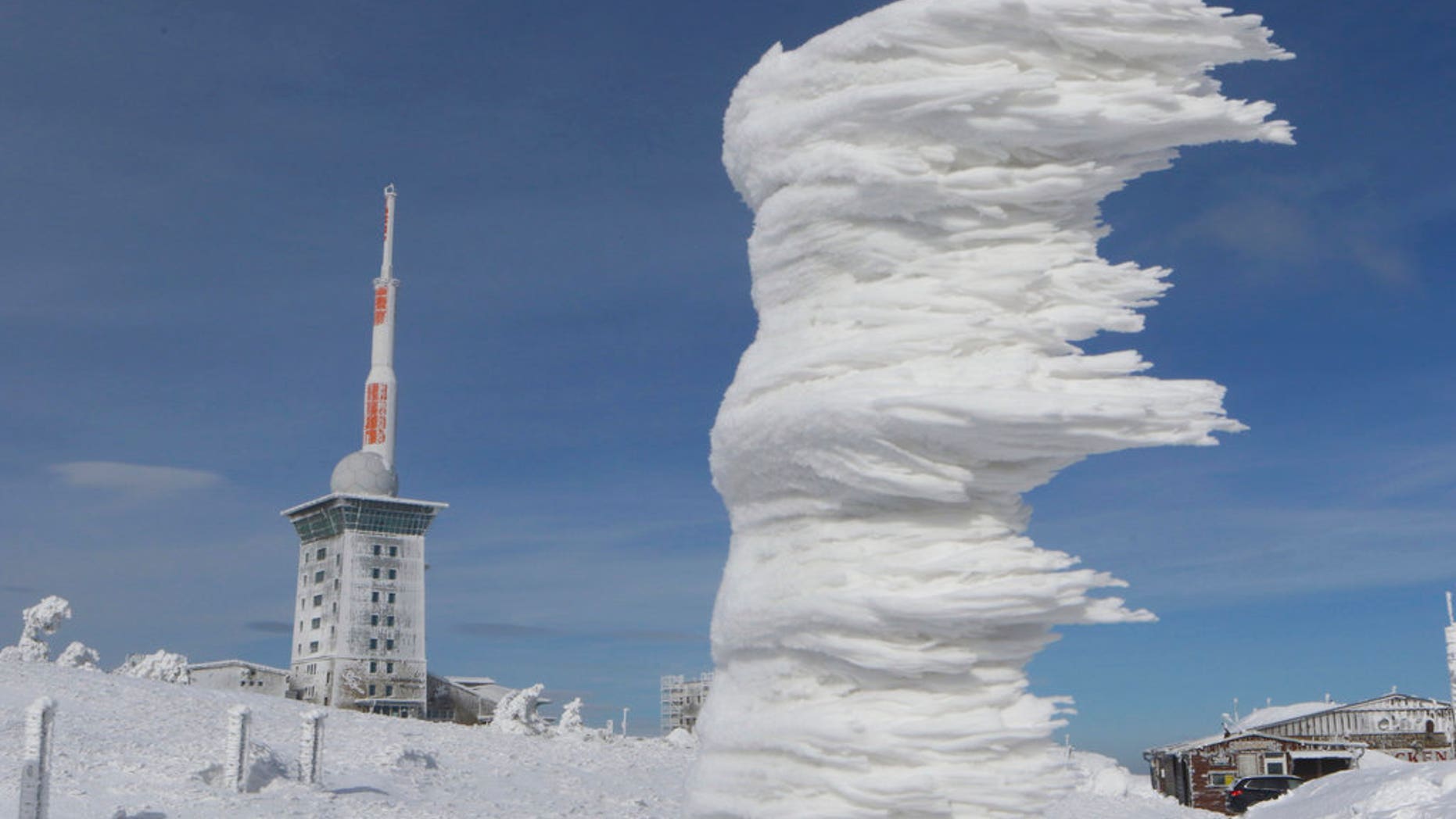 Wind and white frost have formed an ice sculpture on Brocken mountain in the Harz region, Germany, Sunday, March 18, 2018.