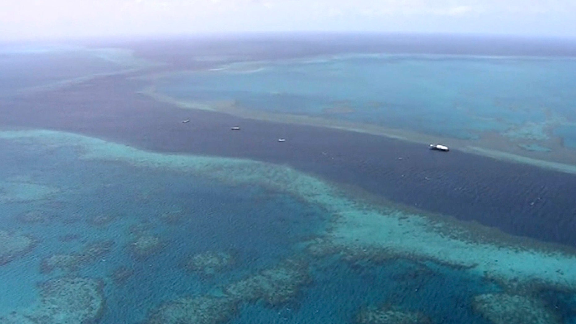 Two Americans were killed and two injured when a helicopter crashed on Australia's Great Barrier Reef. Whitsunday Air Services suspended operations as it works with authorities to determine the cause of the crash.