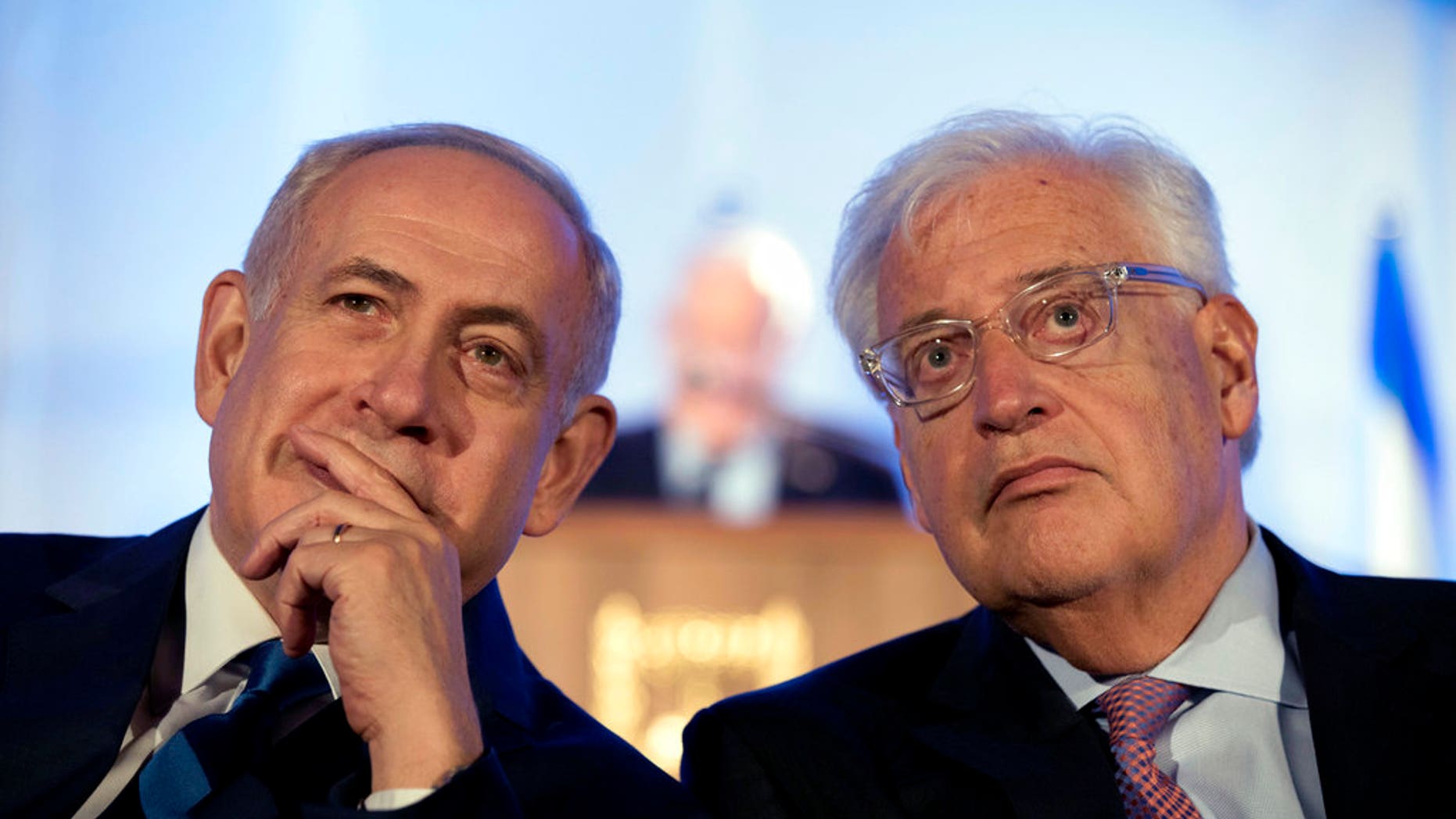Israeli Prime Minister Benjamin Netanyahu, left and David Friedman, right, the new U.S. ambassador to Israel, attend a ceremony celebrating the 50th anniversary of the liberation and unification of Jerusalem, in front of the walls of the Old City of Jerusalem, May 21, 2017.