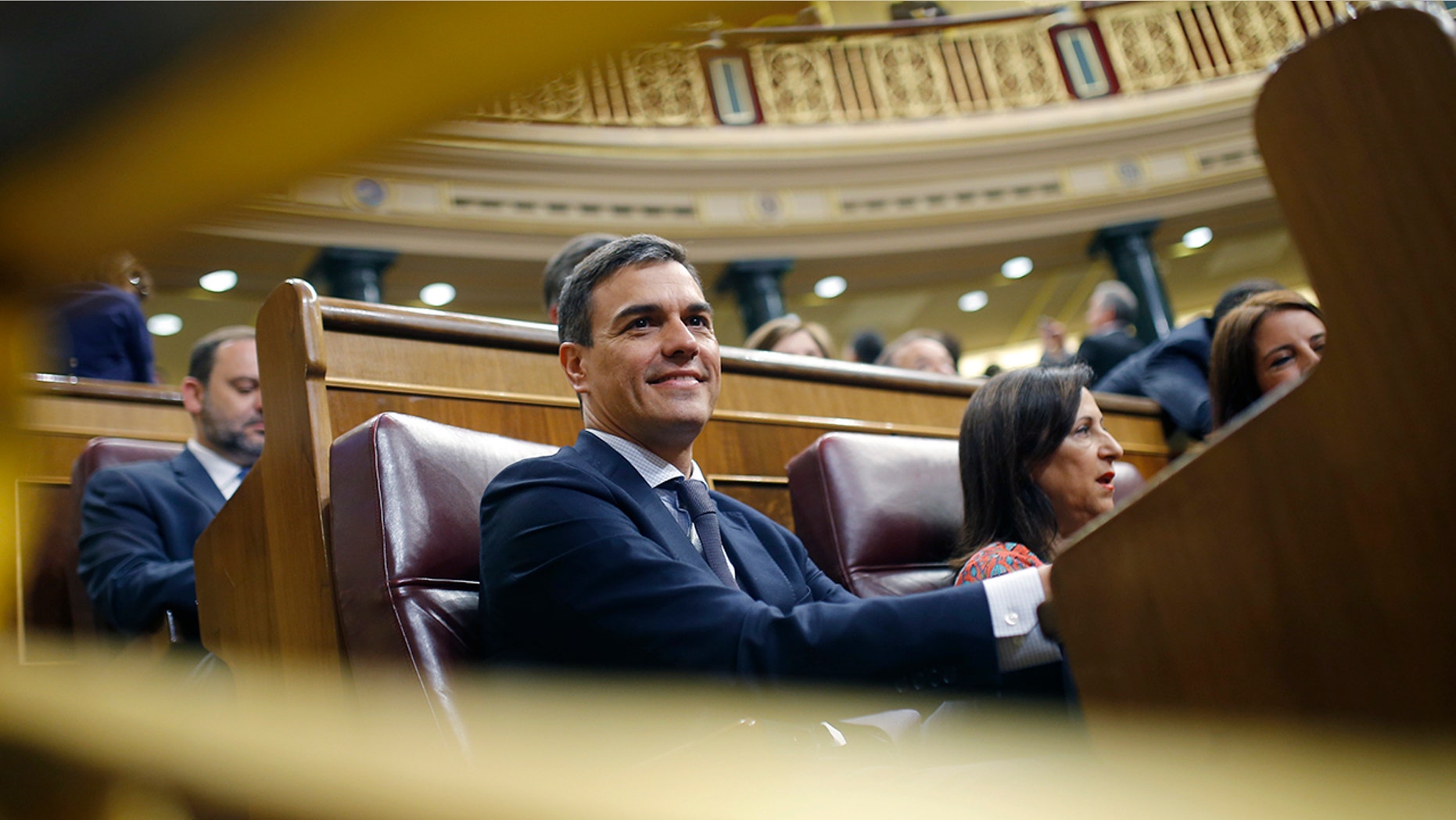 Spain's socialist opposition leader Pedro Sanchez sits at the start of the second day of a motion of no confidence session at the Spanish parliament in Madrid.