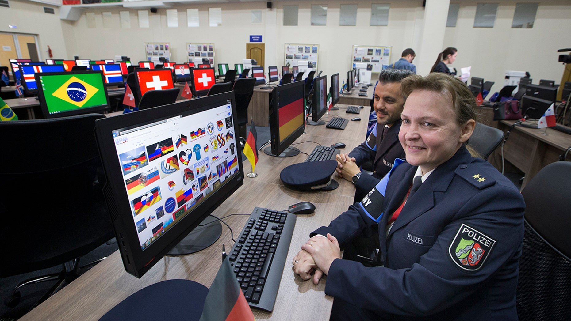 Russian workers who will interact with the thousands of foreign World Cup fans are being taught to smile.