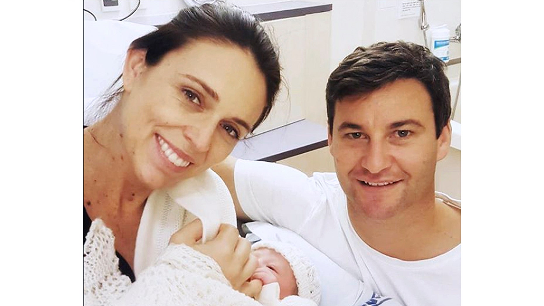 In this photo released by New Zealand Prime Minister Jacinda Ardern on Instagram, Thursday, June 21, 2018, Ardern and her partner Clarke Gayford pose with their newborn daughter at the Auckland City Hospital, Thursday, June 21, 2018, in Auckland, New Zealand. (Jacinda Ardern via AP)