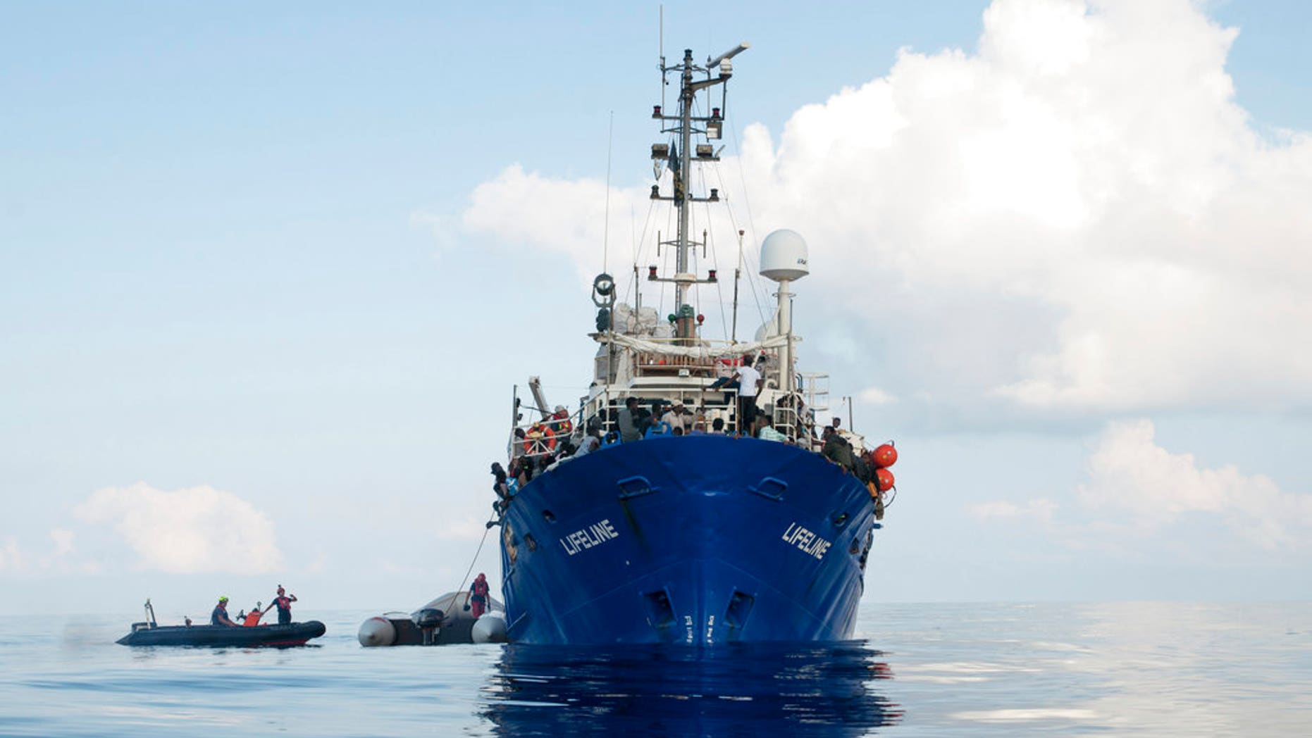 In this photo taken on Thursday, June 21, 2018, a view of the ship operated by the German NGO Mission Lifeline. Italy's interior minister says Malta should allow a Dutch-flagged rescue ship carrying 224 migrants to make port there because the ship is now in Maltese waters. Salvini said the rescue was in Libyan waters, which Lifeline denies. (Hermine Poschmann/Mission Lifeline via AP)