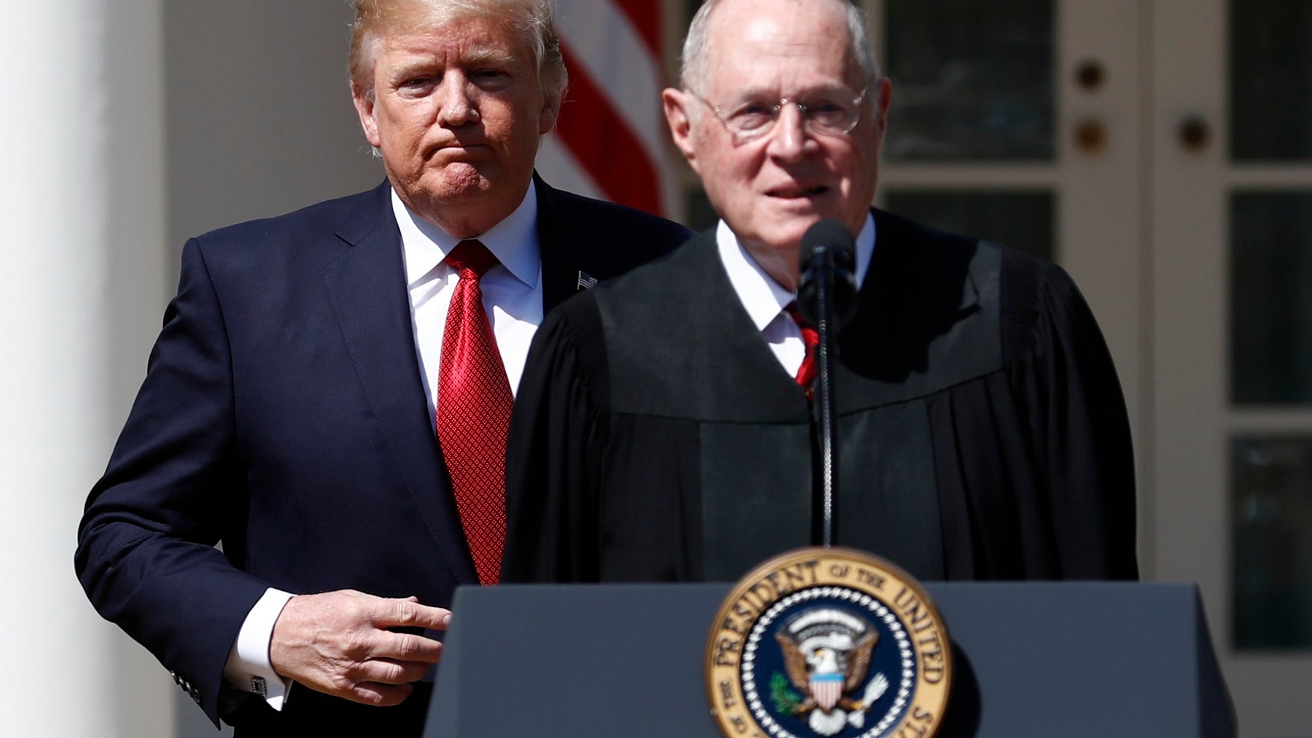 FILE - In this April 10, 2017 photo, President Donald Trump, left, and Supreme Court Justice Anthony Kennedy participate in a public swearing-in ceremony for Justice Neil Gorsuch in the Rose Garden of the White House White House in Washington. The 81-year-old Kennedy said Tuesday, June 27, 2018, that he is retiring after more than 30 years on the court.