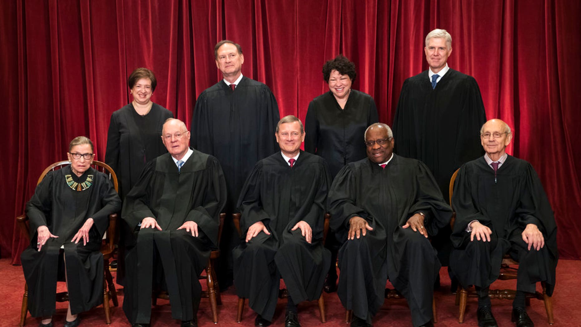 The justices of the U.S. Supreme Court gather for an official group portrait on June 1, 2017, to include new Associate Justice Neil Gorsuch, top row, far right at the Supreme Court Building in Washington. Seated, from left are, Associate Justice Ruth Bader Ginsburg, Associate Justice Anthony M. Kennedy, Chief Justice John Roberts, Associate Justice Clarence Thomas, and Associate Justice Stephen Breyer. Standing, from left are, Associate Justice Elena Kagan, Associate Justice Samuel Alito Jr., Associate Justice Sonia Sotomayor, and Associate Justice Neil Gorsuch.