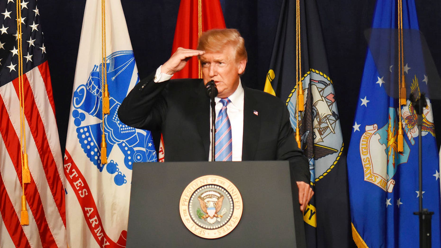 President Donald Trump speaks at a Salute to Service charity dinner in conjunction with the PGA Tour's Greenbrier Classic at the Greenbrier in White Sulphur Springs, W.Va., July 3, 2018.