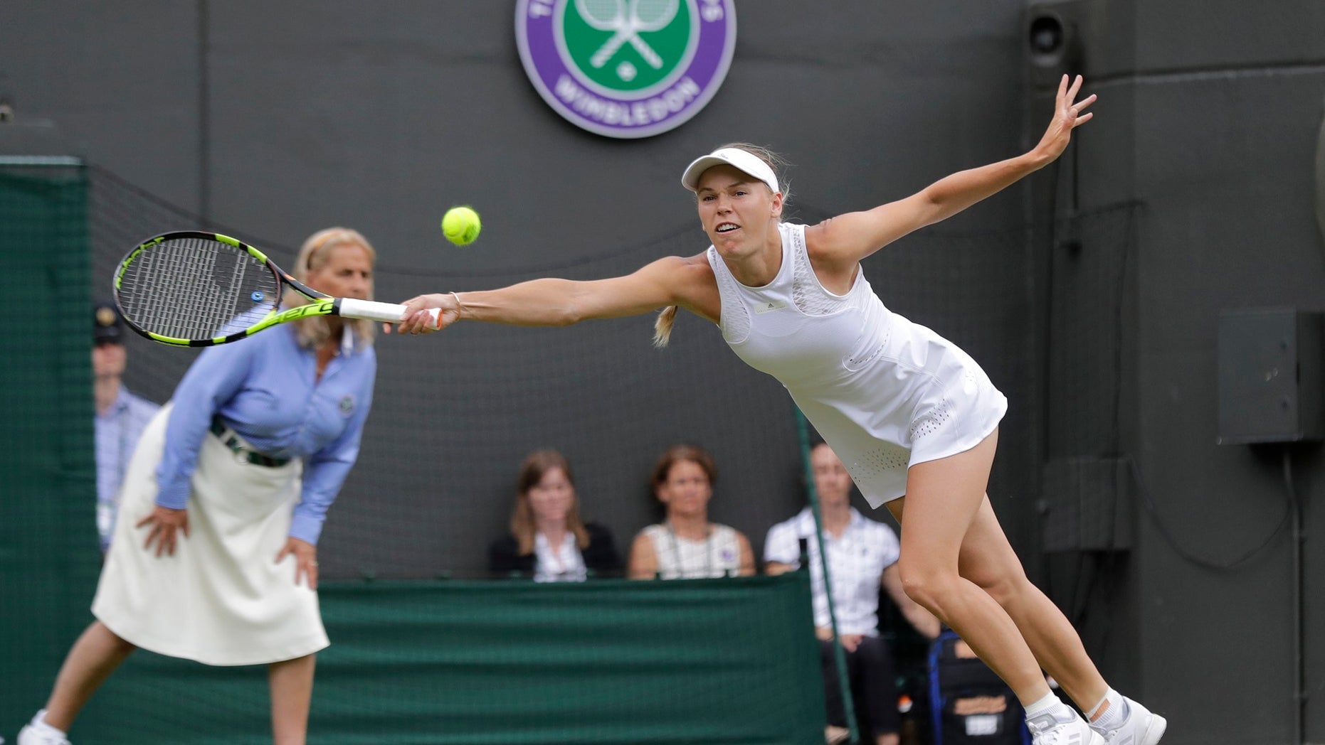 No. 2 Caroline Wozniacki was defeated at Wimbledon Wednesday by Ekaterina Makarova of Russia in the second-round match.