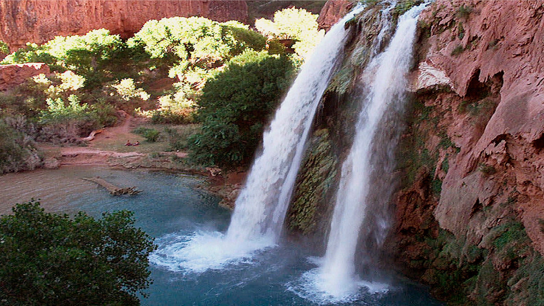 This 1997 file photo shows one of five waterfalls on Havasu Creek as its waters tumble 210 feet on the Havasupai Tribe's reservation in a southeastern branch of the Grand Canyon near Supai, Ariz.