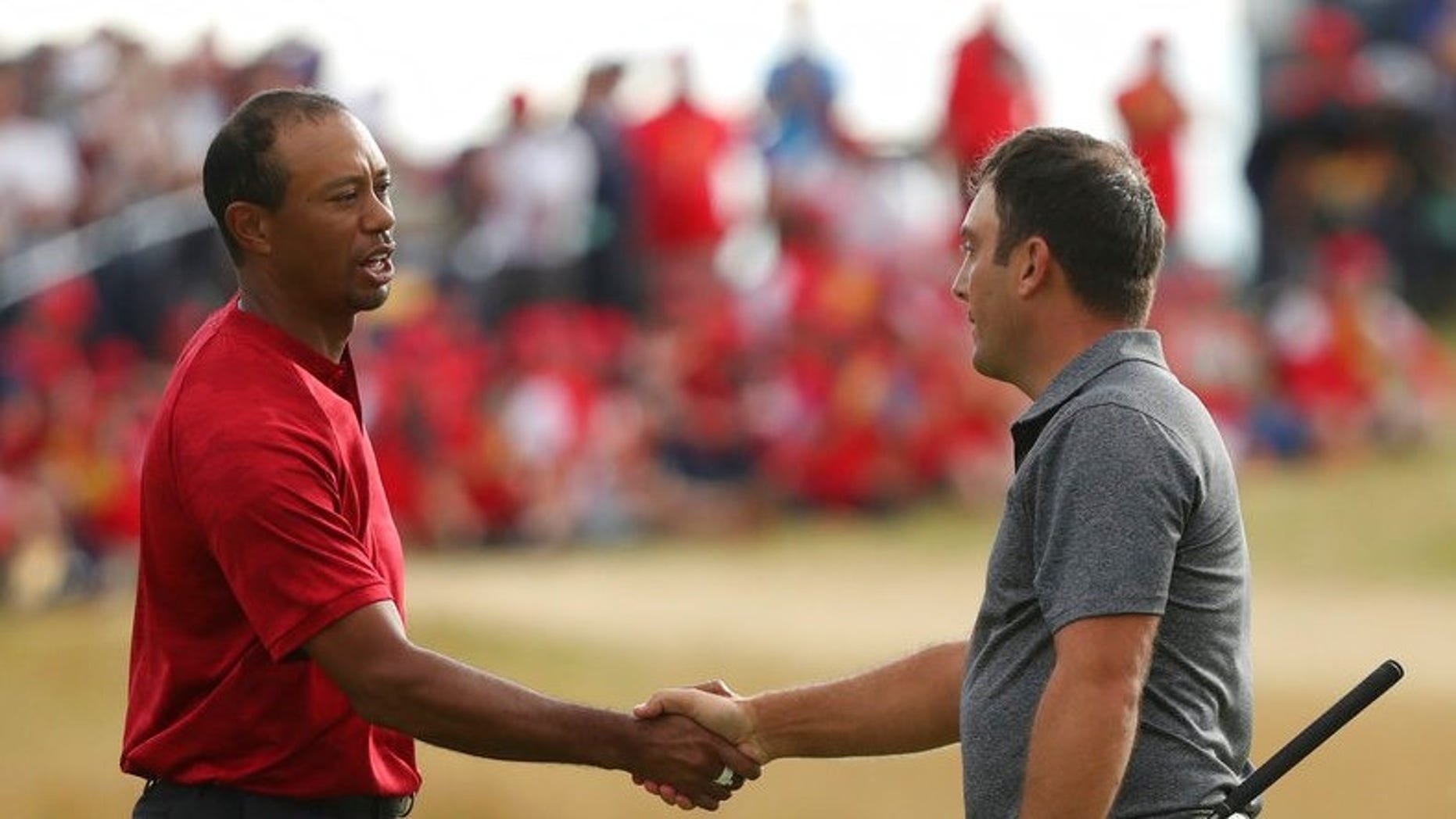Francesco Molinari of Italy beats out Tiger Woods for the Open Championship.