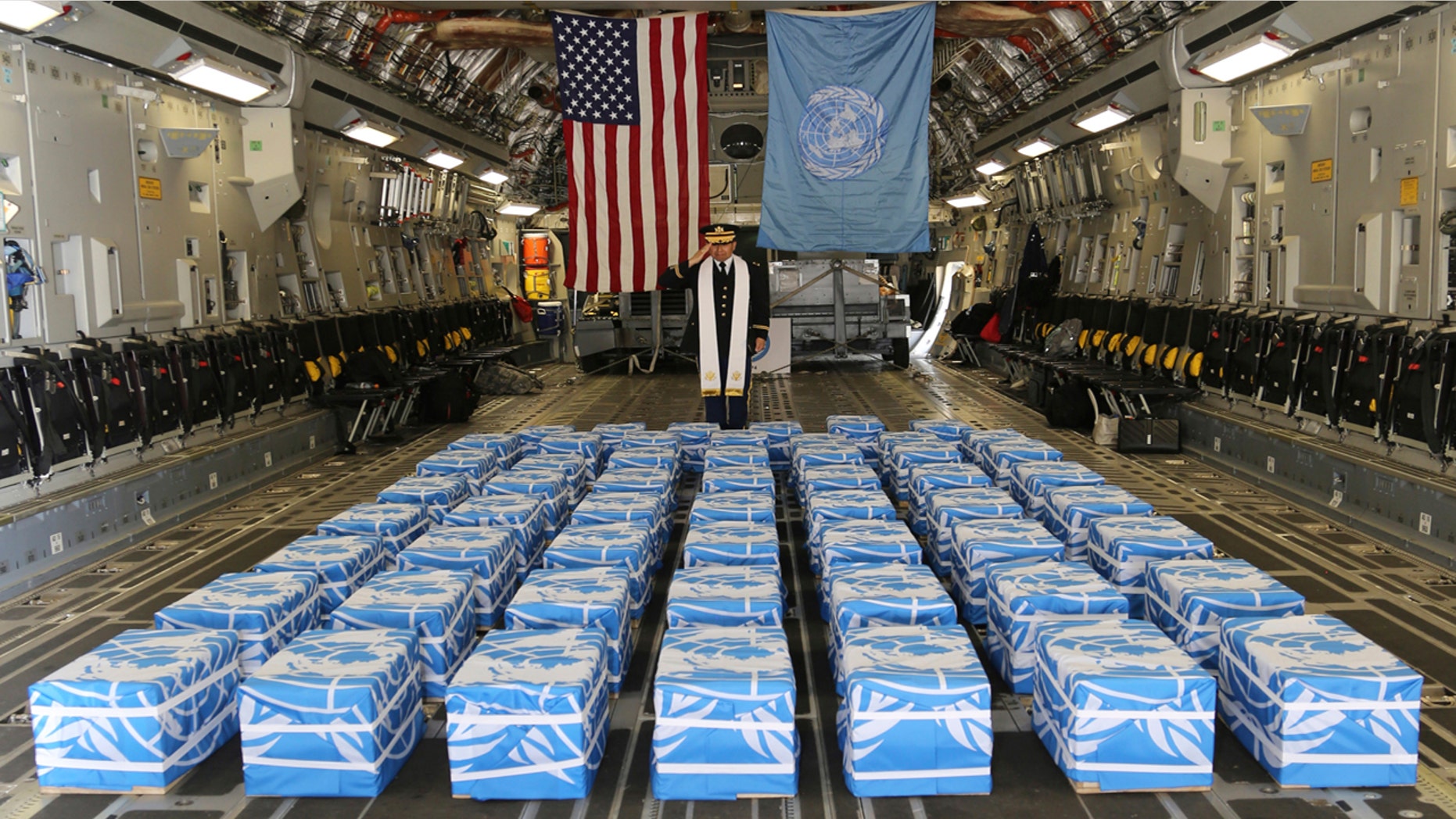 United Nations Command Chaplain U.S. Army Col. Sam Lee performs a blessing of sacrifice and remembrance on the 55 cases of remains believed to be U.S. servicemen killed during the Korean War and returned by North Korea at Osan Air Base in Pyeongtaek, South Korea, July 27, 2018.