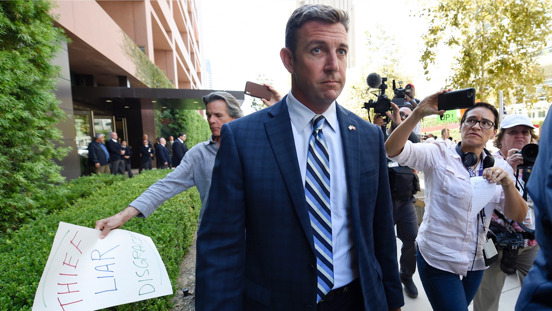 U.S. Rep. Duncan Hunter leaves an arraignment hearing in San Diego, Aug. 23, 2018.