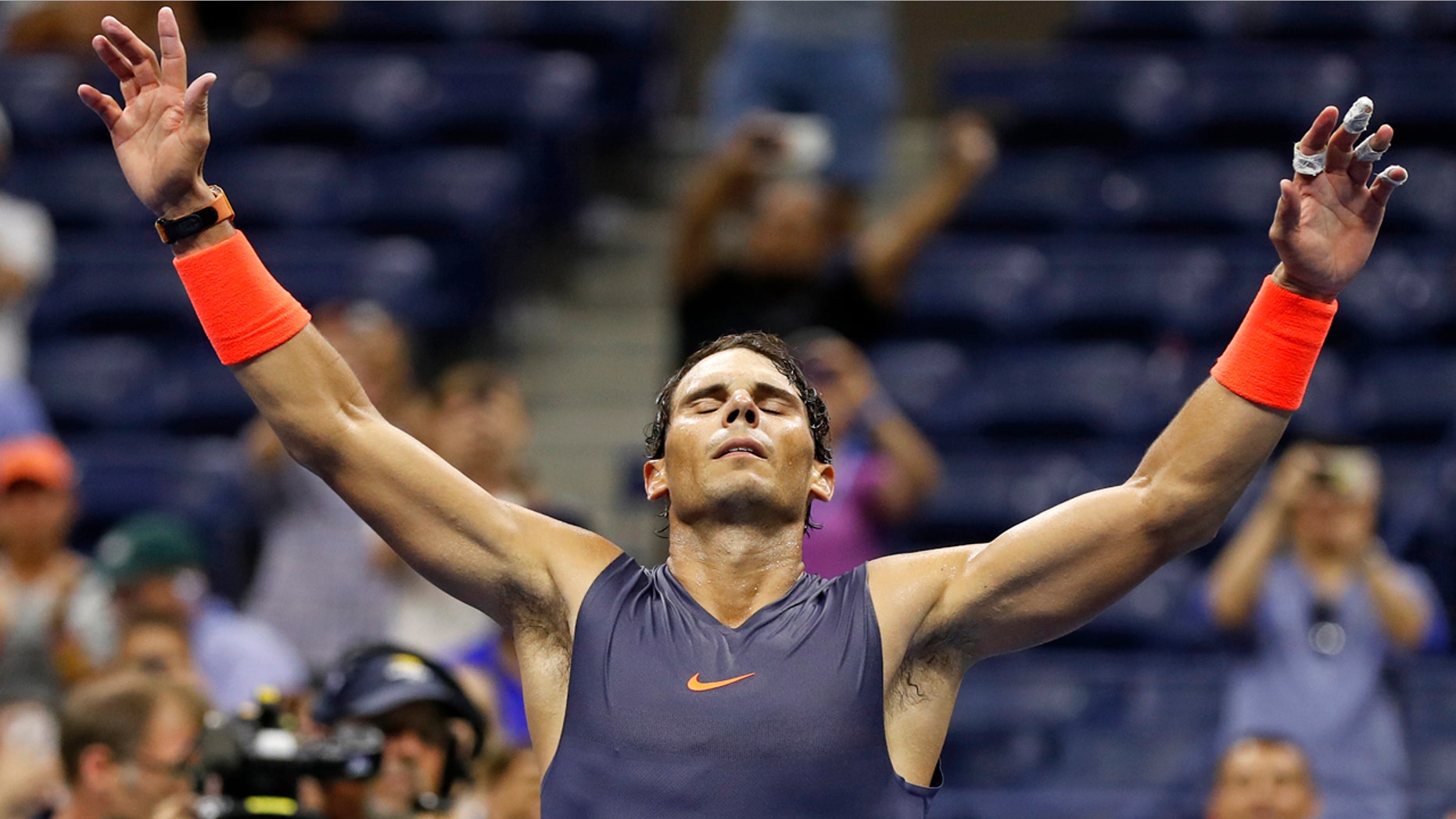 Rafael Nadal, of Spain, celebrates after defeating Dominic Thiem, of Austria, during the quarterfinals of the U.S. Open tennis tournament, early Wednesday, Sept. 5, 2018, in New York.