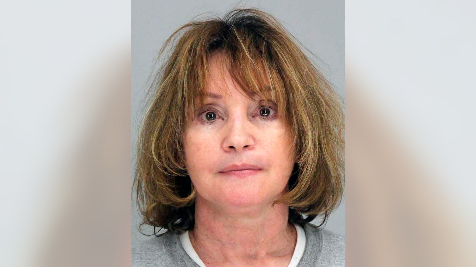 A woman who owns a child care facility in Texas is in custody on accusations of child endangerment after she allegedly tied shoe laces around young children’s necks to help restrain them in their car seats, a report said.