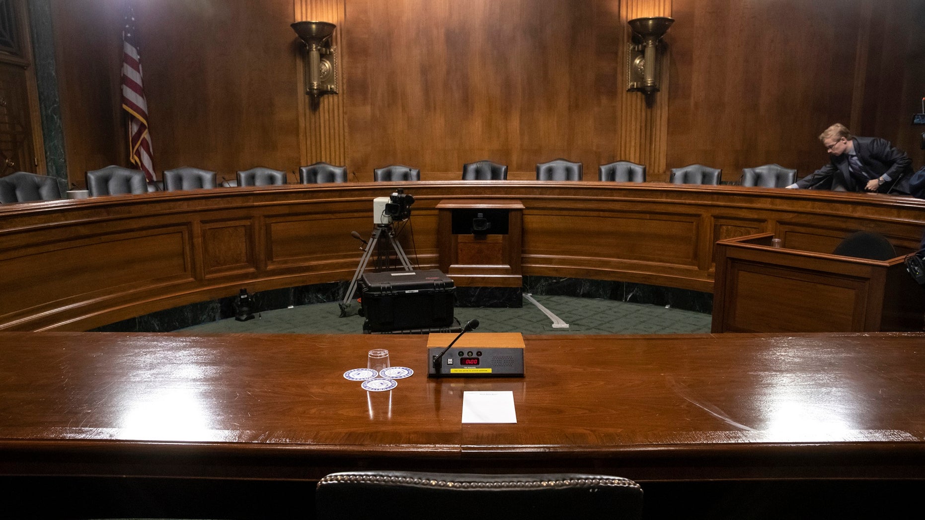 The Senate Judiciary Committee hearing room is prepared for Thursday's planned testimony from Christine Blasey Ford on Capitol Hill in Washington, Wednesday, Sept. 26, 2018. (AP Photo/J. Scott Applewhite)