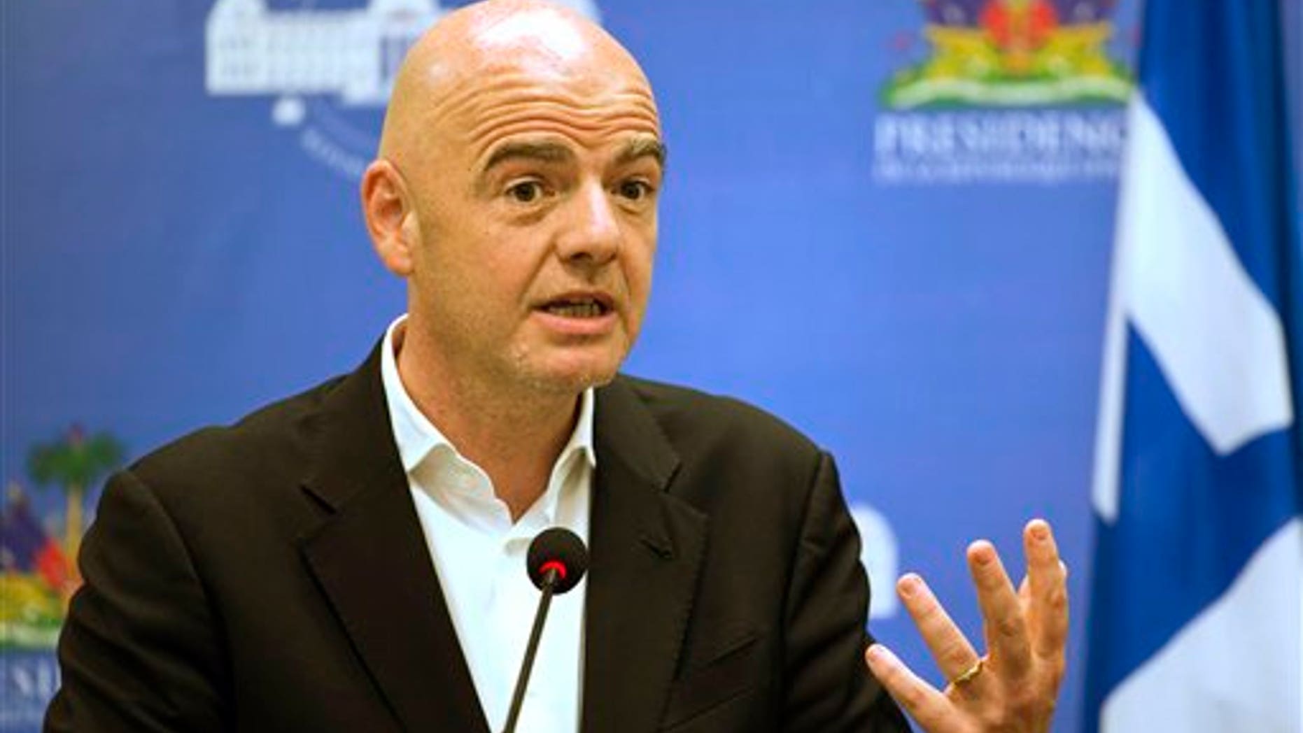 President of FIFA Gianni Infantino hosts a press conference in Haiti in April 2017.