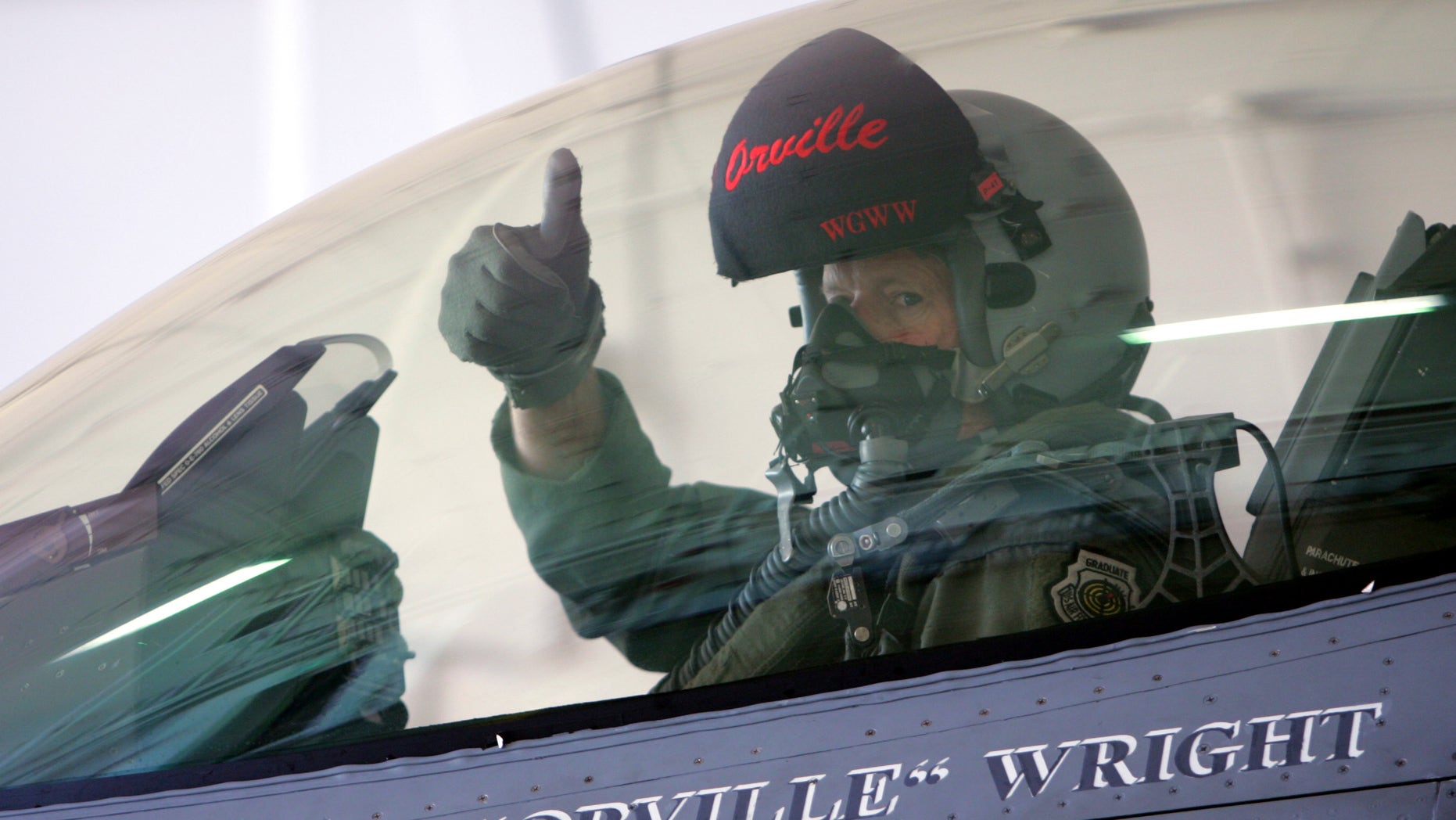 ** ADVANCE FOR SUNDAY MAY 7 ** Lt. Gen. Bruce Wright flashes a thumbs-up signal from the cockpit of an F-16 fighter jet during a training at Misawa Air Base, northern Japan, Oct. 11, 2005. The F-16 Wild Weasel is primarily intended to locate and destroy surface-to-air missiles. (AP Photo/Itsuo Inouye)