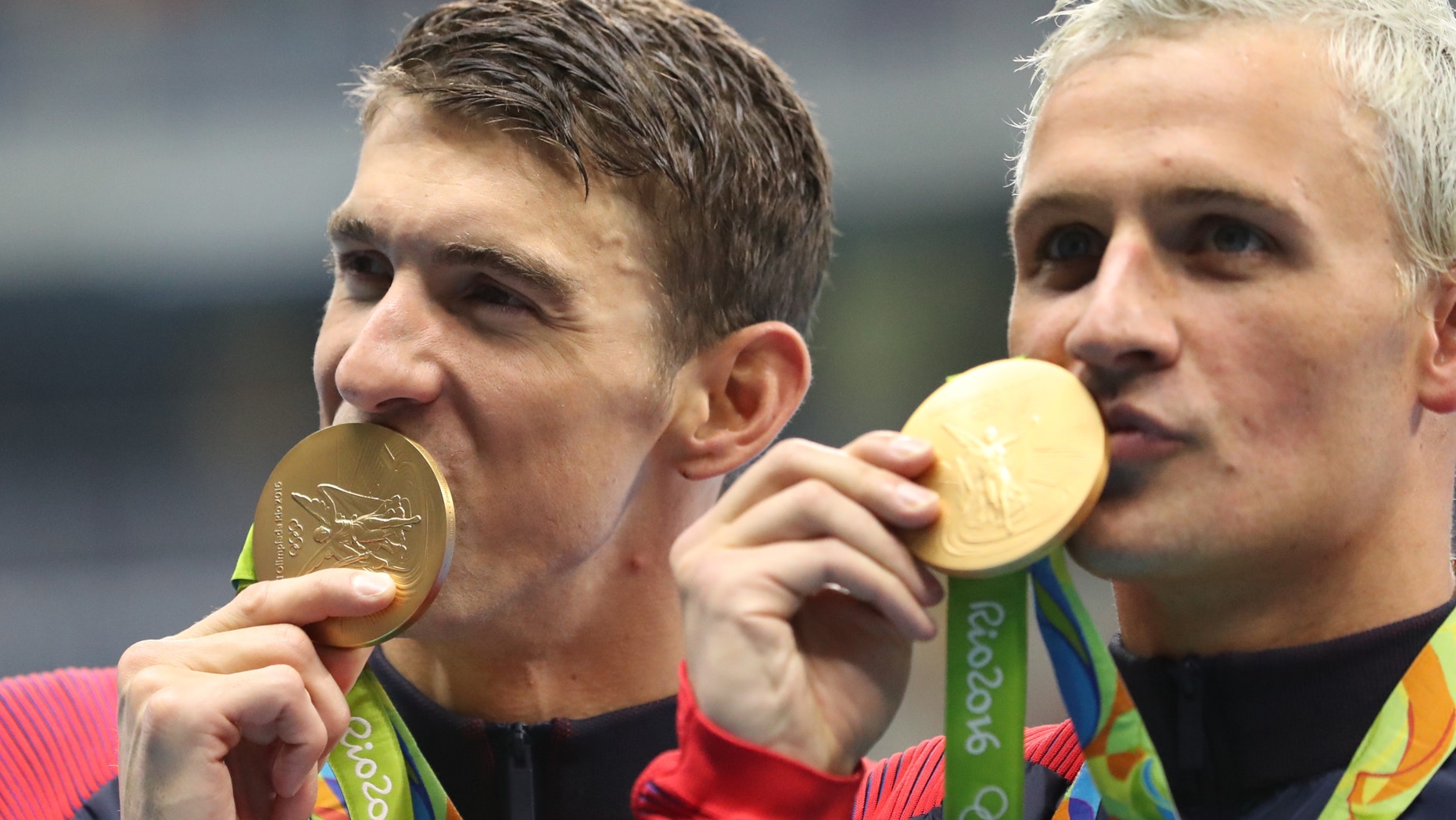 Michael Phelps and Ryan Lochte celebrate winning the gold medal in the men's 4x200-meter freestyle relay Wednesday.