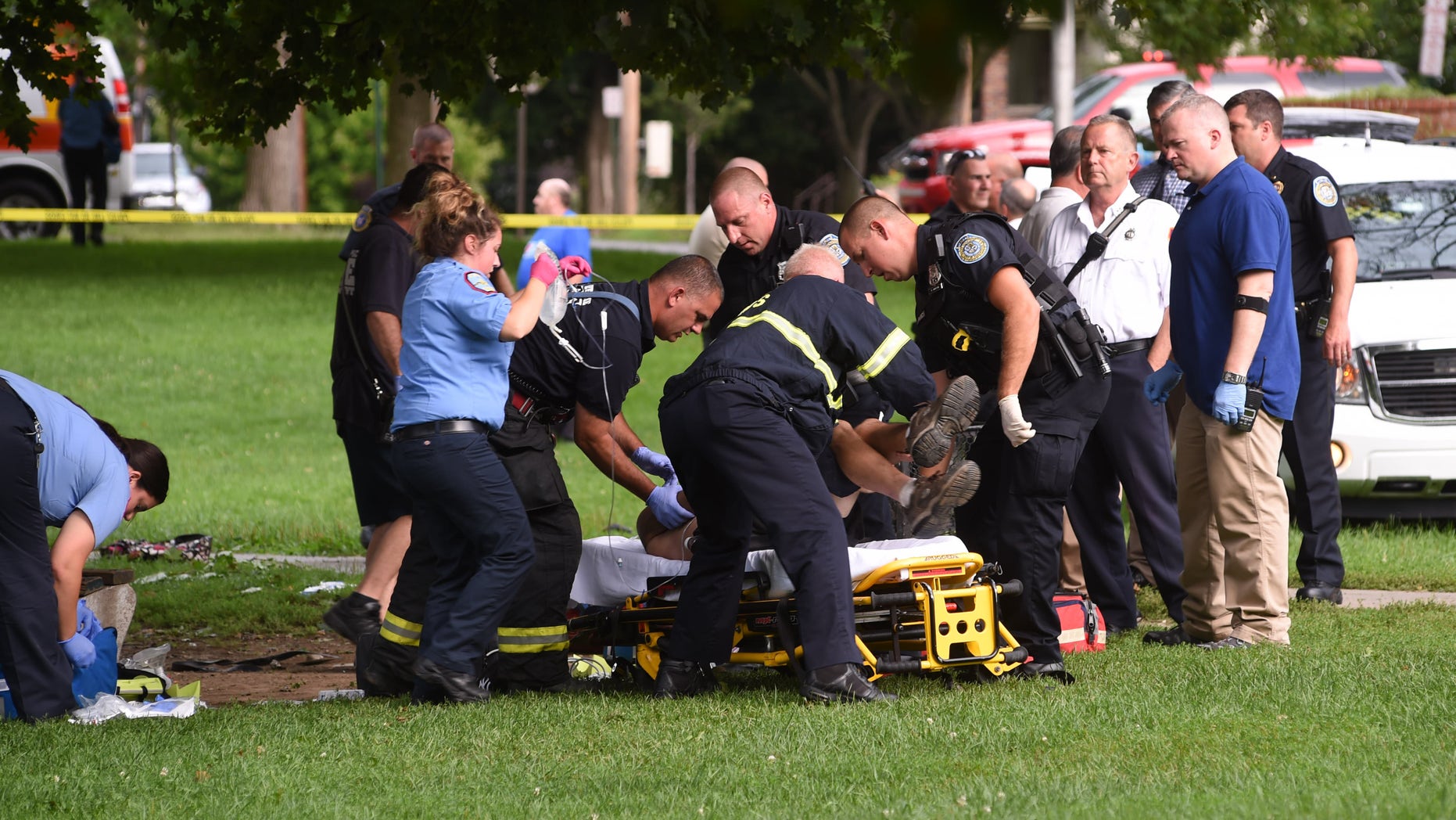 Emergency personnel at Mansion Square Park in Poughkeepsie on Friday.