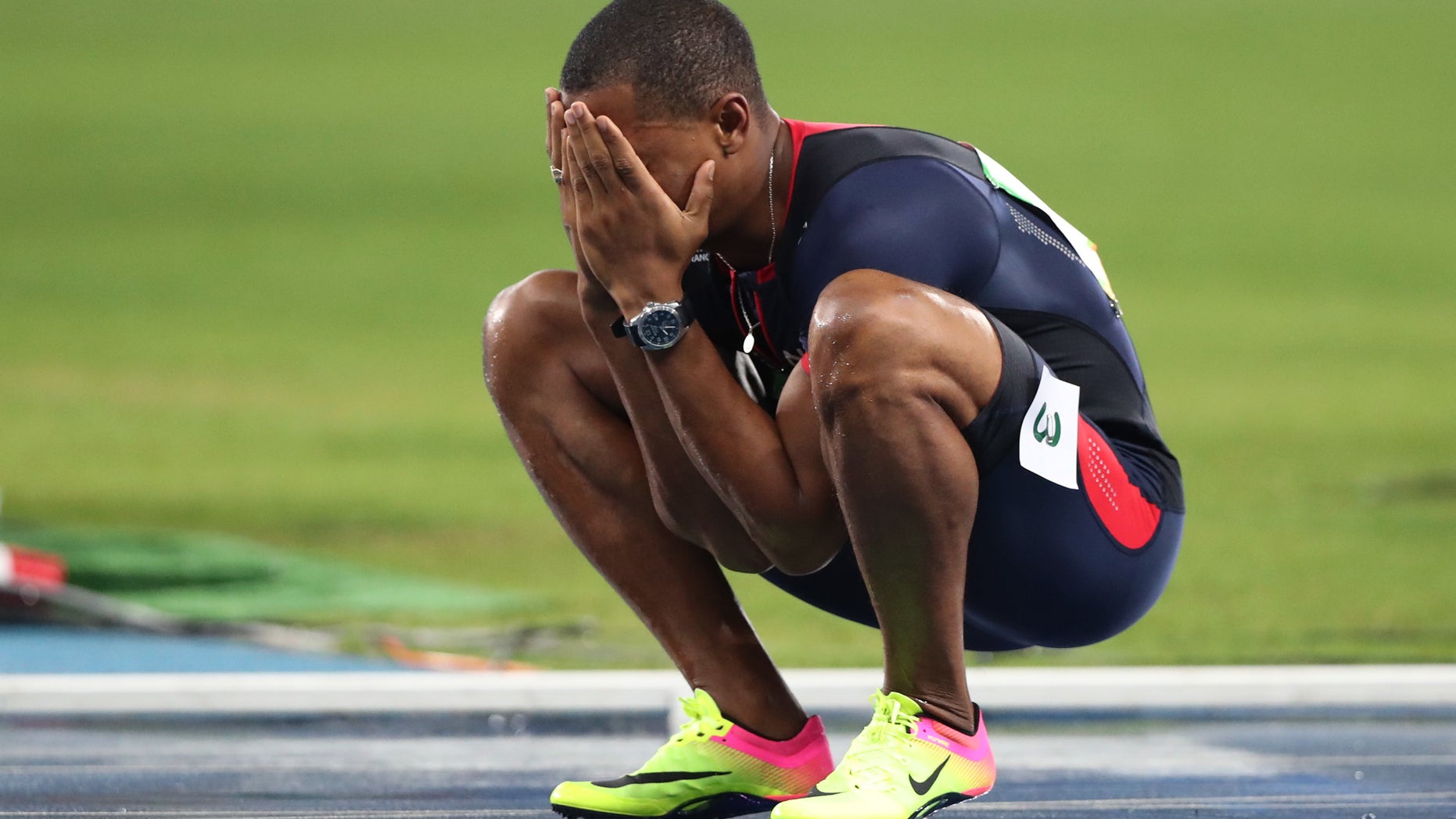 France's Wilhem Belocian reacts after being disqualified for a false start during the athletics competitions of the 2016 Summer Olympics at the Olympic stadium in Rio de Janeiro, Brazil, Monday, Aug. 15, 2016. (AP Photo/Lee Jin-man)
