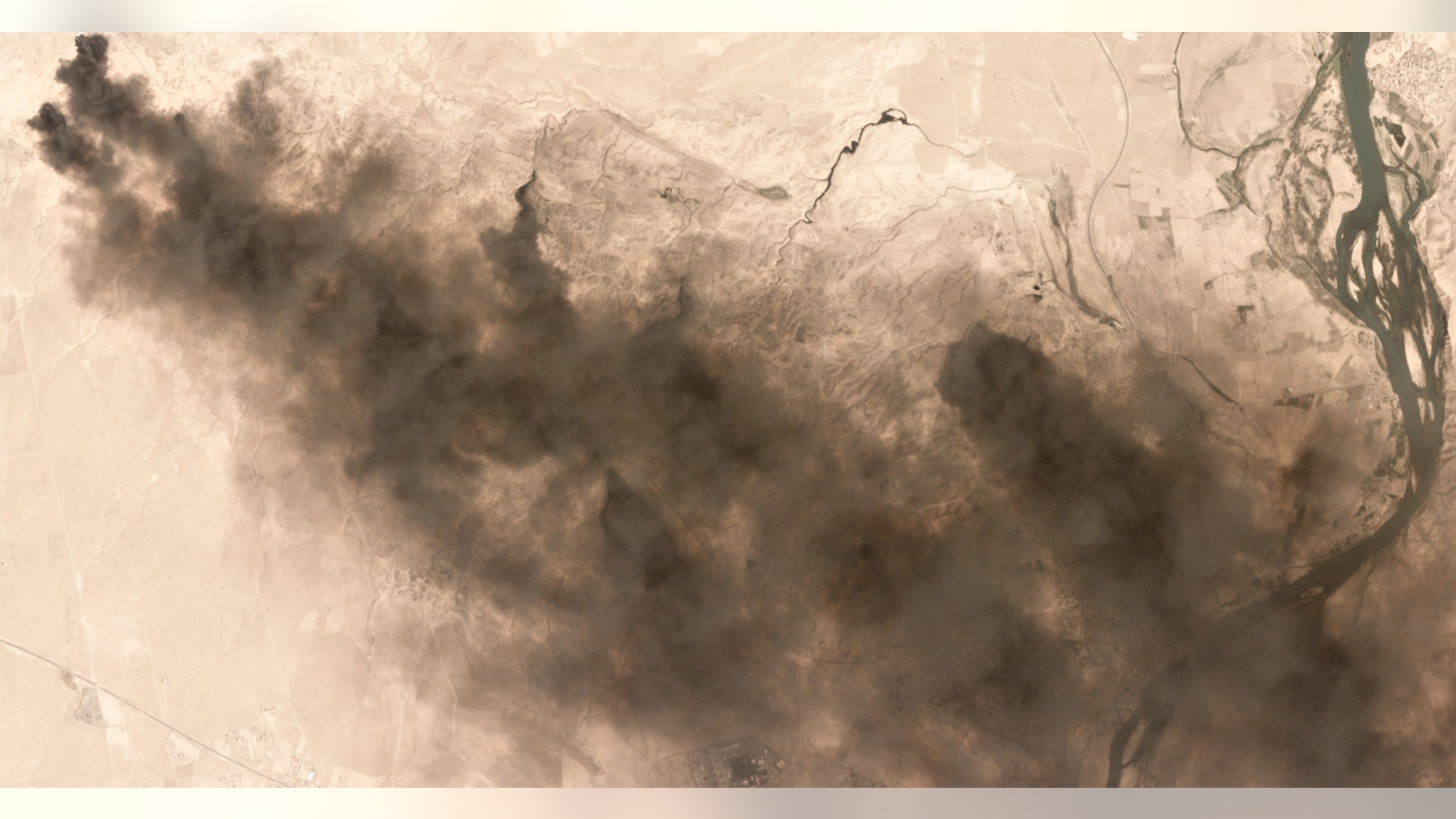 Burning oil fields seen near Qayyarah, Iraq, in this Sept. 4 image.