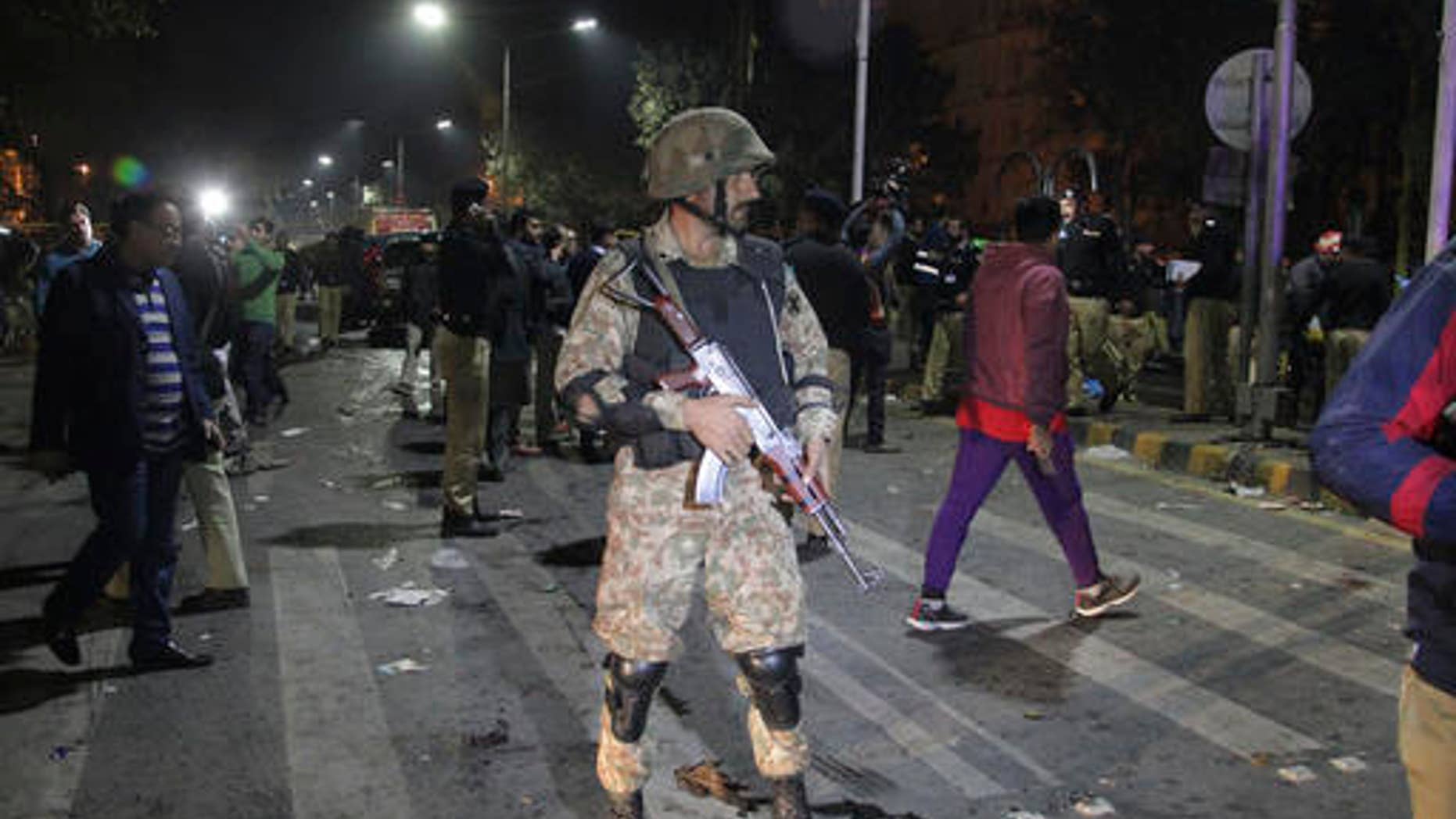 Police and security officers at the bombing scene.