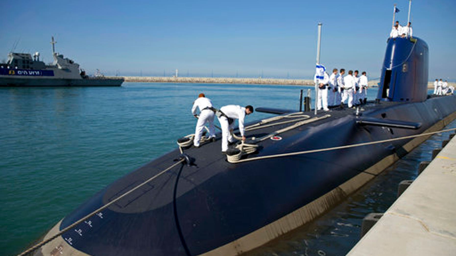Israeli sailors stand on a German-built "Rahav" submarine on its arrival in to the military port in Haifa, Israel, in January 2016.