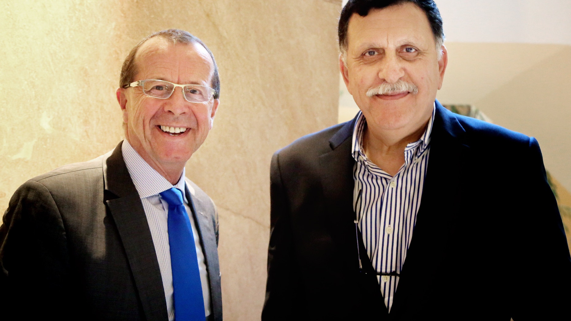 U.N. special envoy for Libya Martin Kobler, left, is greeted in Cairo by Fayez Serraj, Libyan designated-prime minister and head of the presidential council, in February.