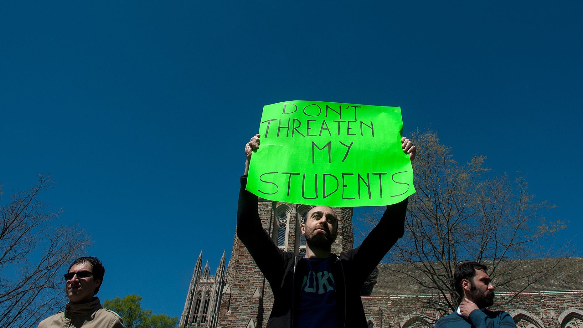 Matteo Gilebbi, center, an Italian instructor at Duke University, during a protest Sunday.