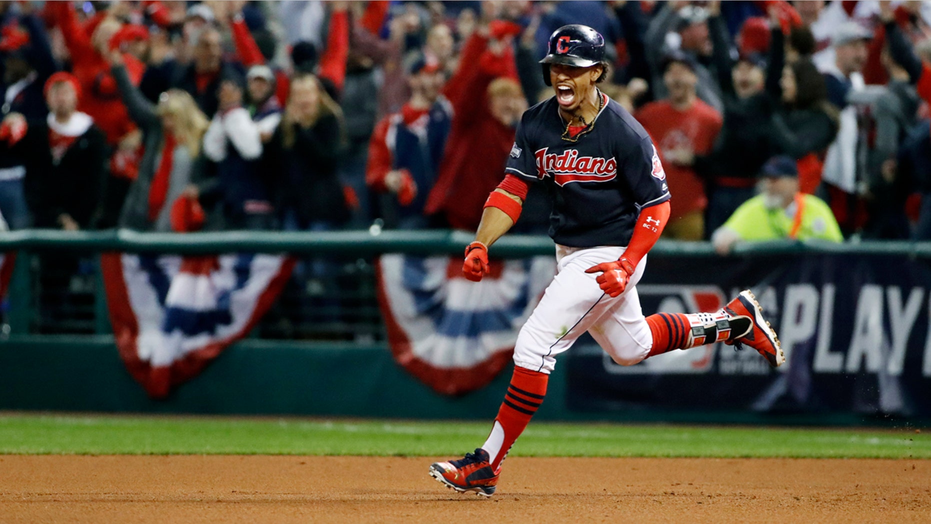 Cleveland Indians' Francisco Lindor rounds the bases on his two-run home run against the Toronto Blue Jays during the sixth inning in Game 1 of baseball's American League Championship Series in Cleveland, Friday, Oct. 14, 2016.(AP Photo/Gene J. Puskar)