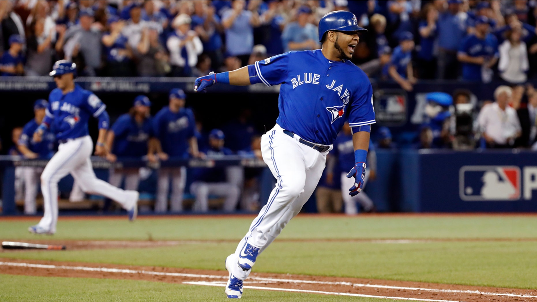 Oct. 18, 2016: Toronto Blue Jays' Edwin Encarnacion celebrates after his two-RBI double against the Cleveland Indians during the seventh inning in Game 4 of baseball's American League Championship Series in Toronto.