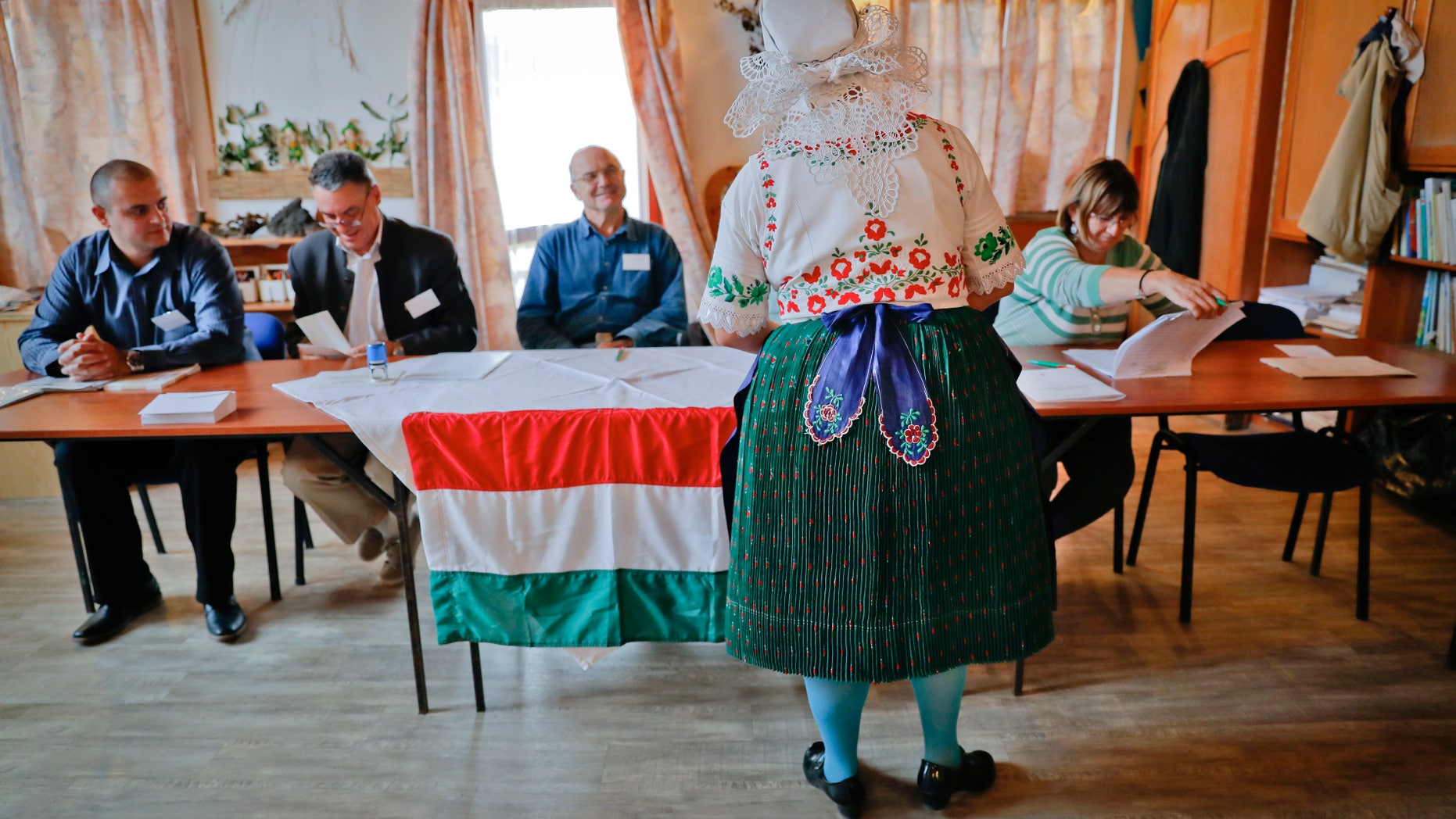 Edit Piros votes in a referendum in Hungary on Sunday.