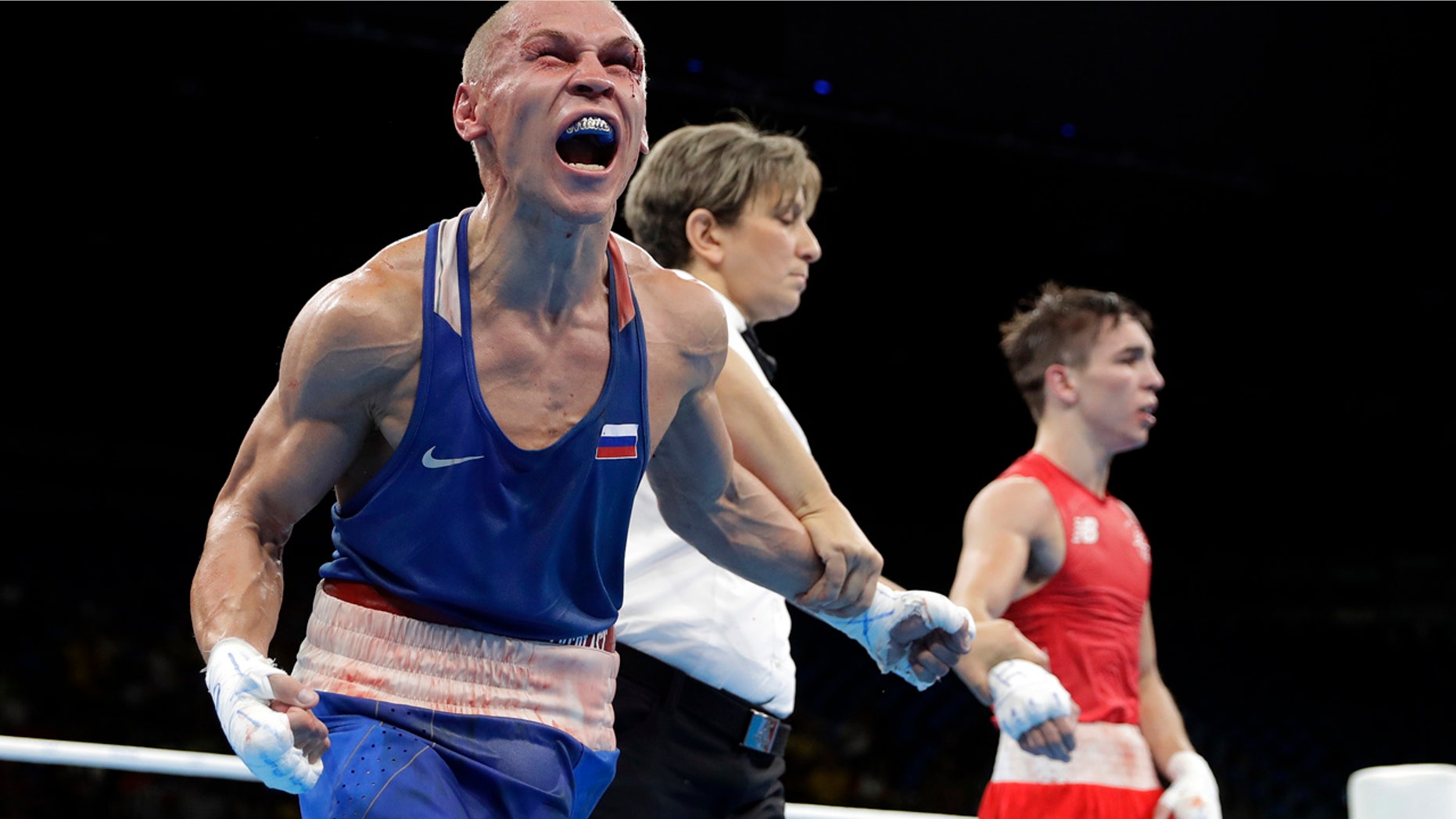 Aug. 16, 2016: Russia's Vladimir Nikitin, left, reacts as he won a men's bantamweight 56-kg quarterfinals boxing match against Ireland's Michael John Conlan at the 2016 Summer Olympics in Rio de Janeiro, Brazil.