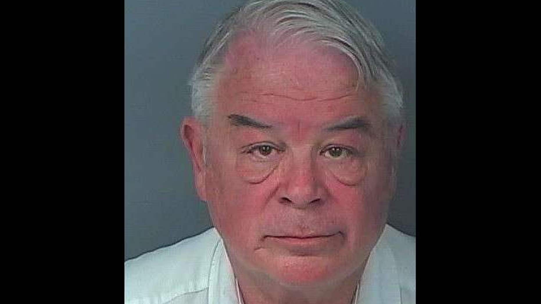 Commissioner Nick Nicholson, 71, was booked into Hernando County Detention Center on charges relating to prostitution, authorities say.