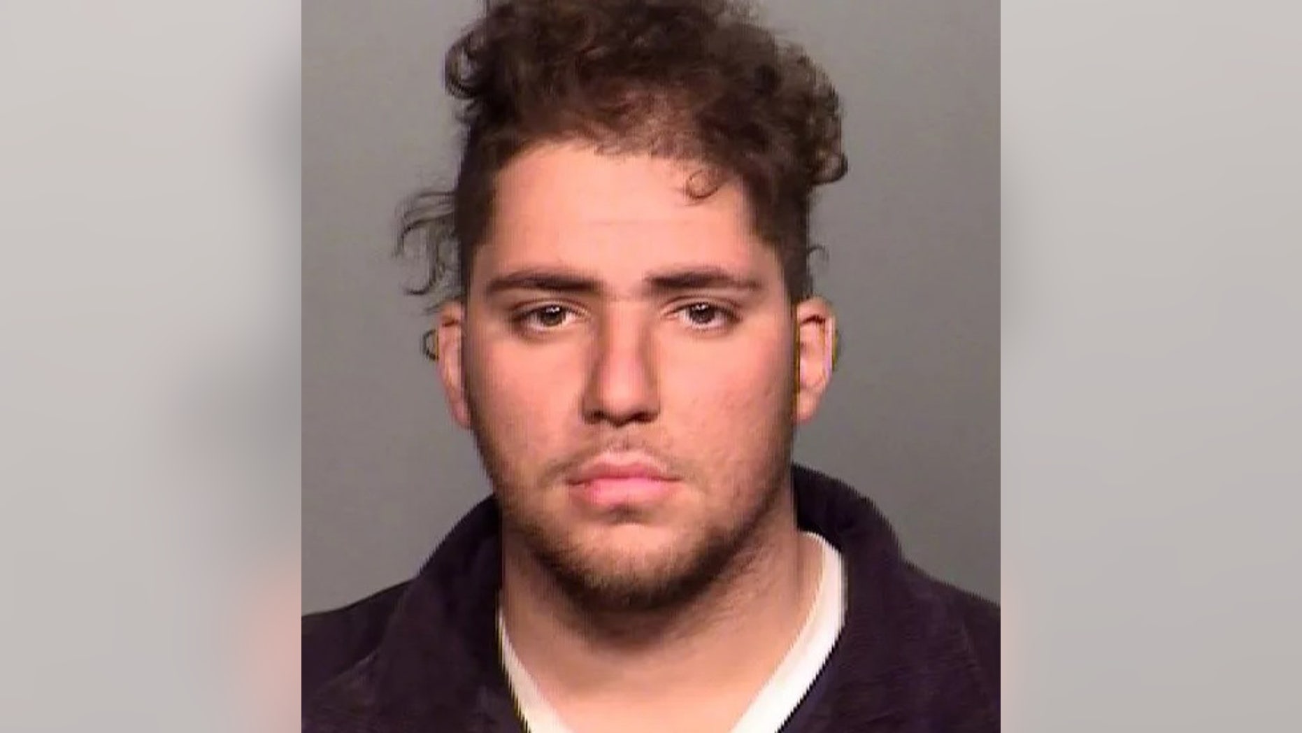 Ahmed Alaklouk, a Saudi Arabian citizen, faces a federal charge for allegedly possessing an AR-15-style rifle, a report said.