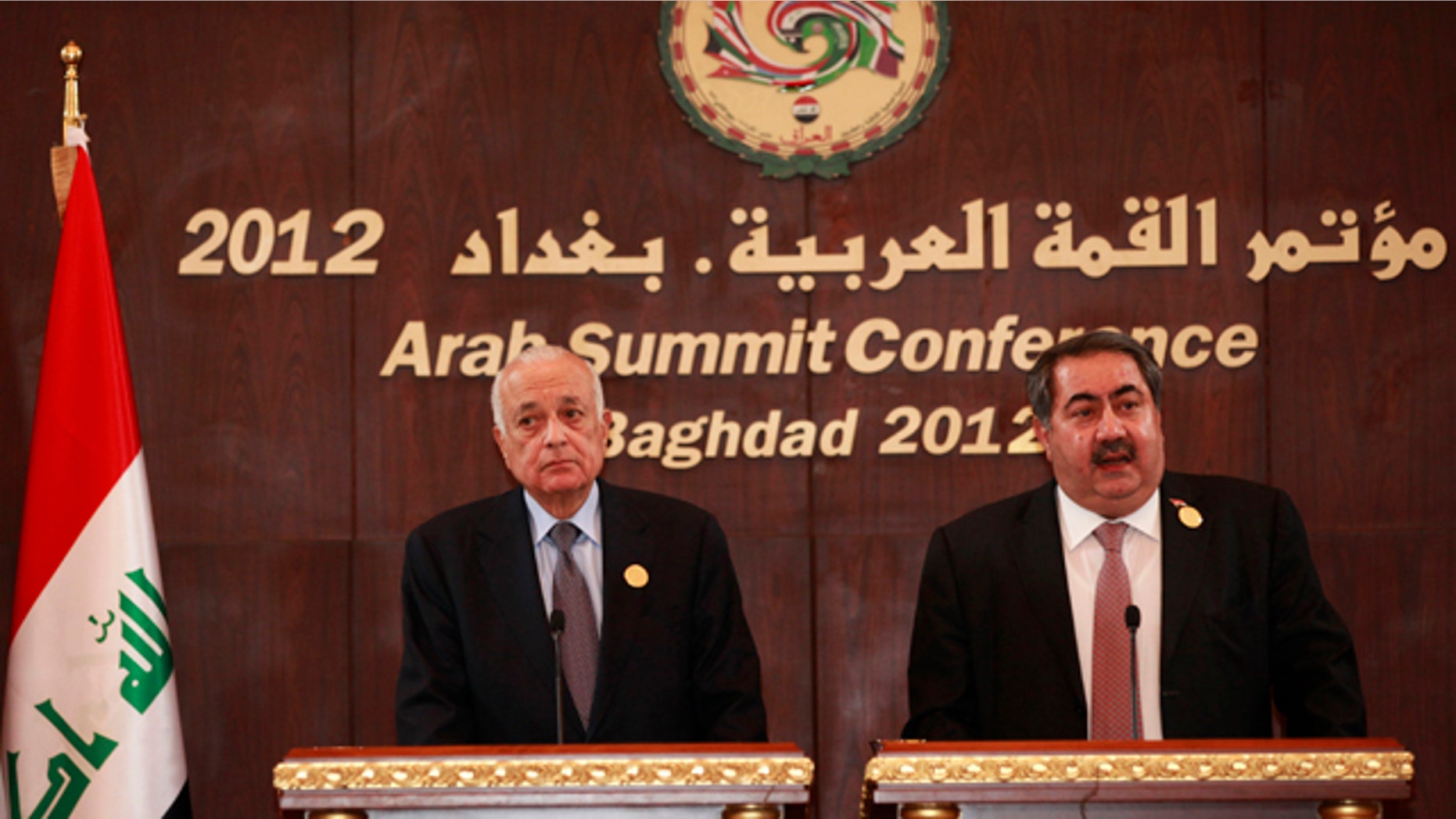 March 28, 2012: Arab League Secretary General Nabil Elaraby, left, and Iraqi Foreign Minister Hoshyar Zebari, right, hold a joint press conference in Baghdad, Iraq.