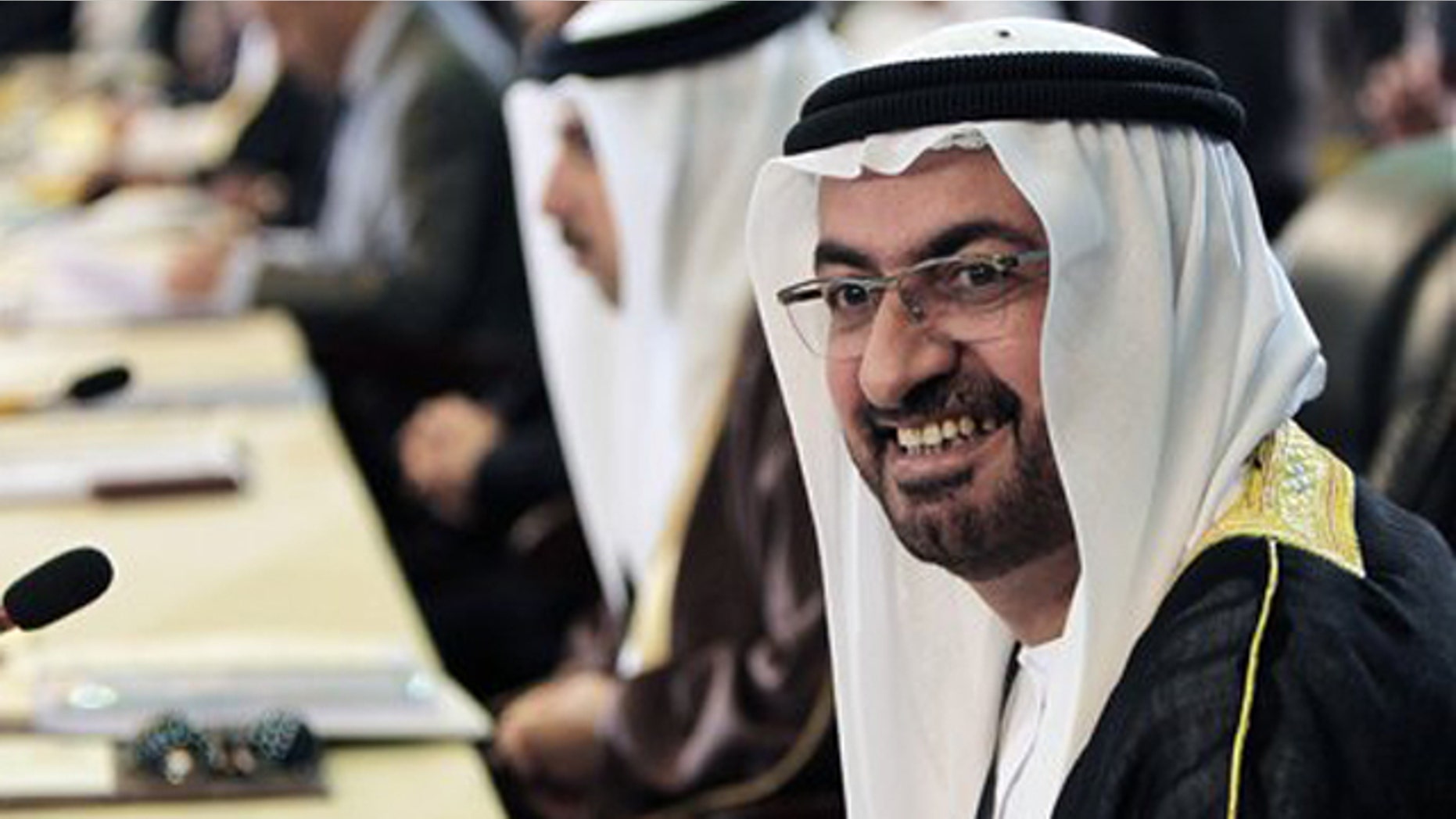March 27, 2012: UAE Ambassador to Iraq Abdullah al-Shihy, right, attends the meeting of Arab economic, finance, and trade ministers as part of Arab League Summit in Baghdad, Iraq.
