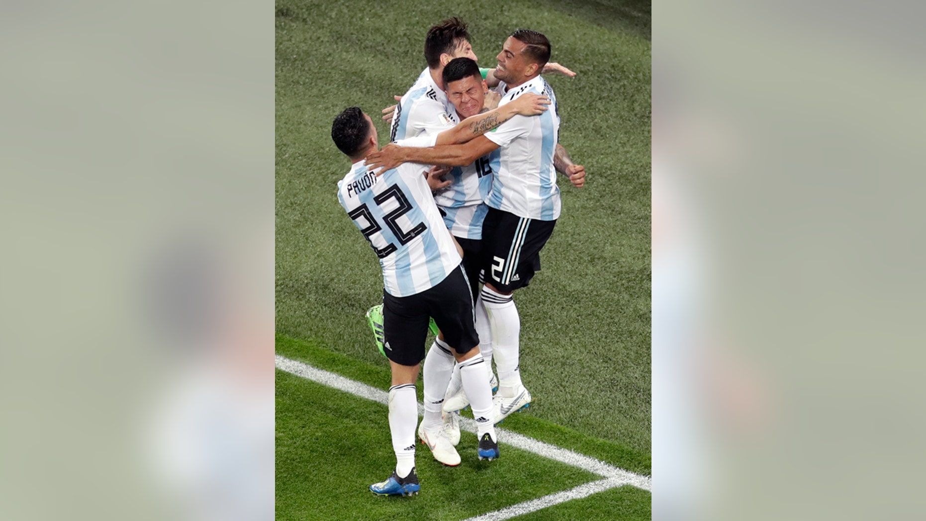 Argentina celebrate Marcus Rojo's match-winning goal in the 86th minute of their game against Nigeria in St. Petersburg.