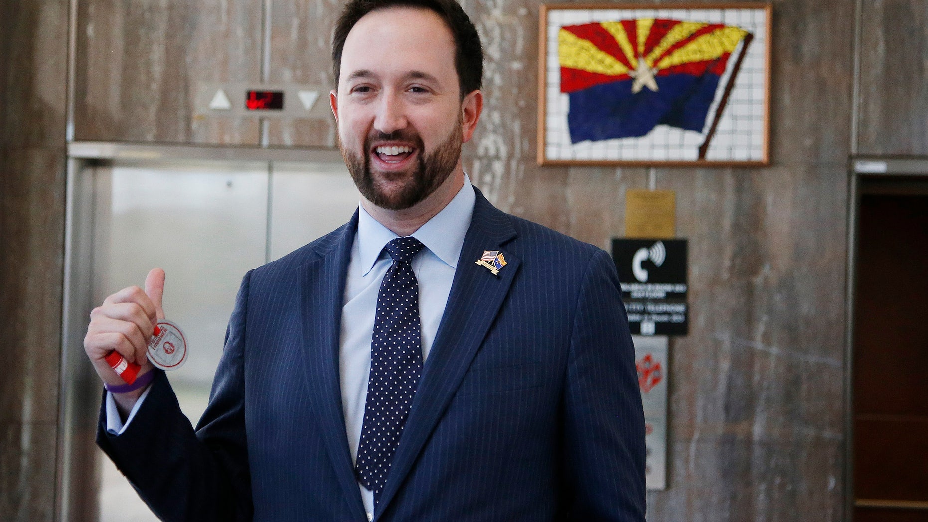 Aug. 14, 2014: Republican Arizona congressional candidate and current state Rep. Adam Kwasman, R-Oro Valley, arrives for a news conference.