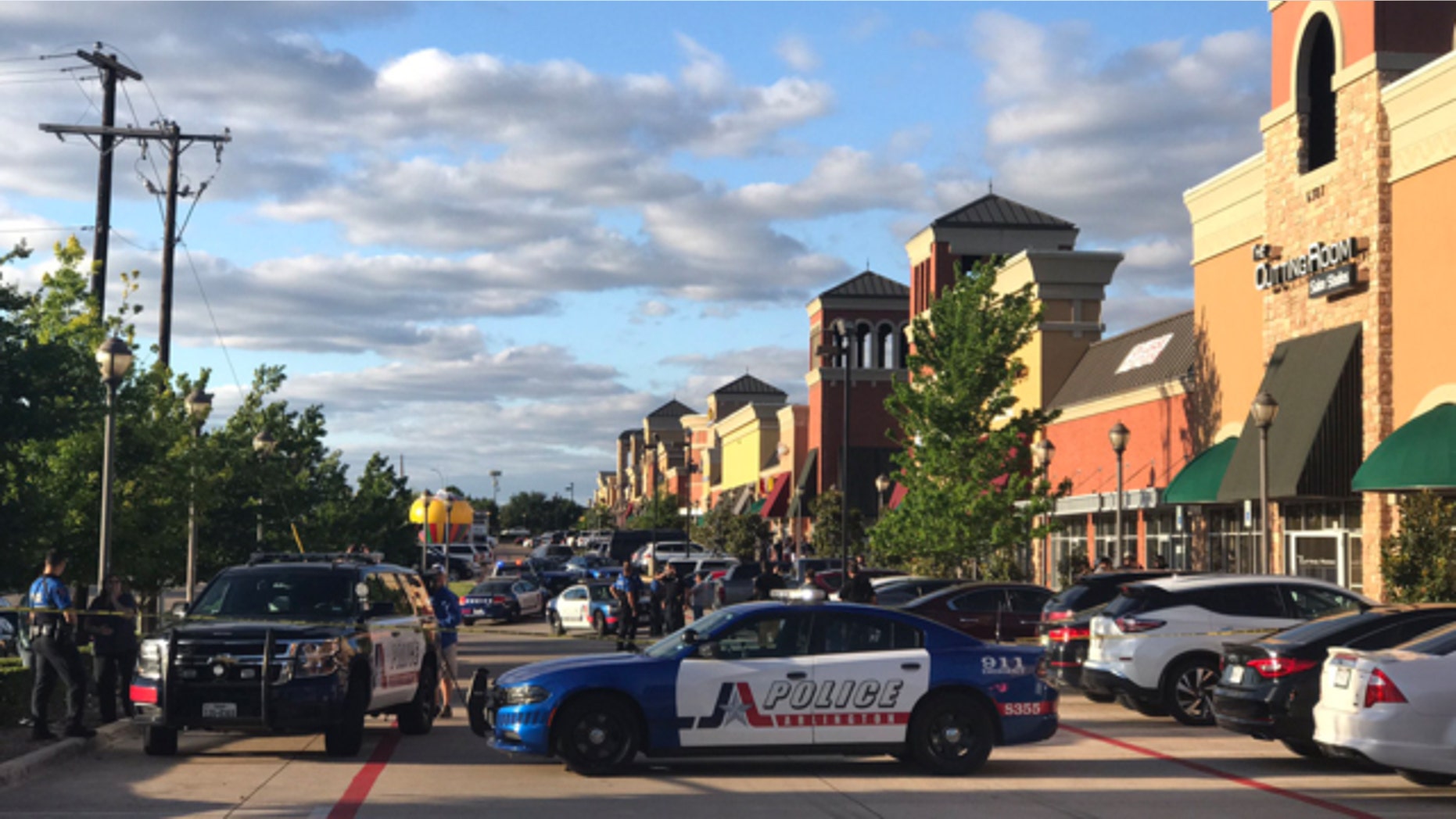 Police in Arlington, Texas respond to the scene of a shooting on Wednesday, May 3, 2017.