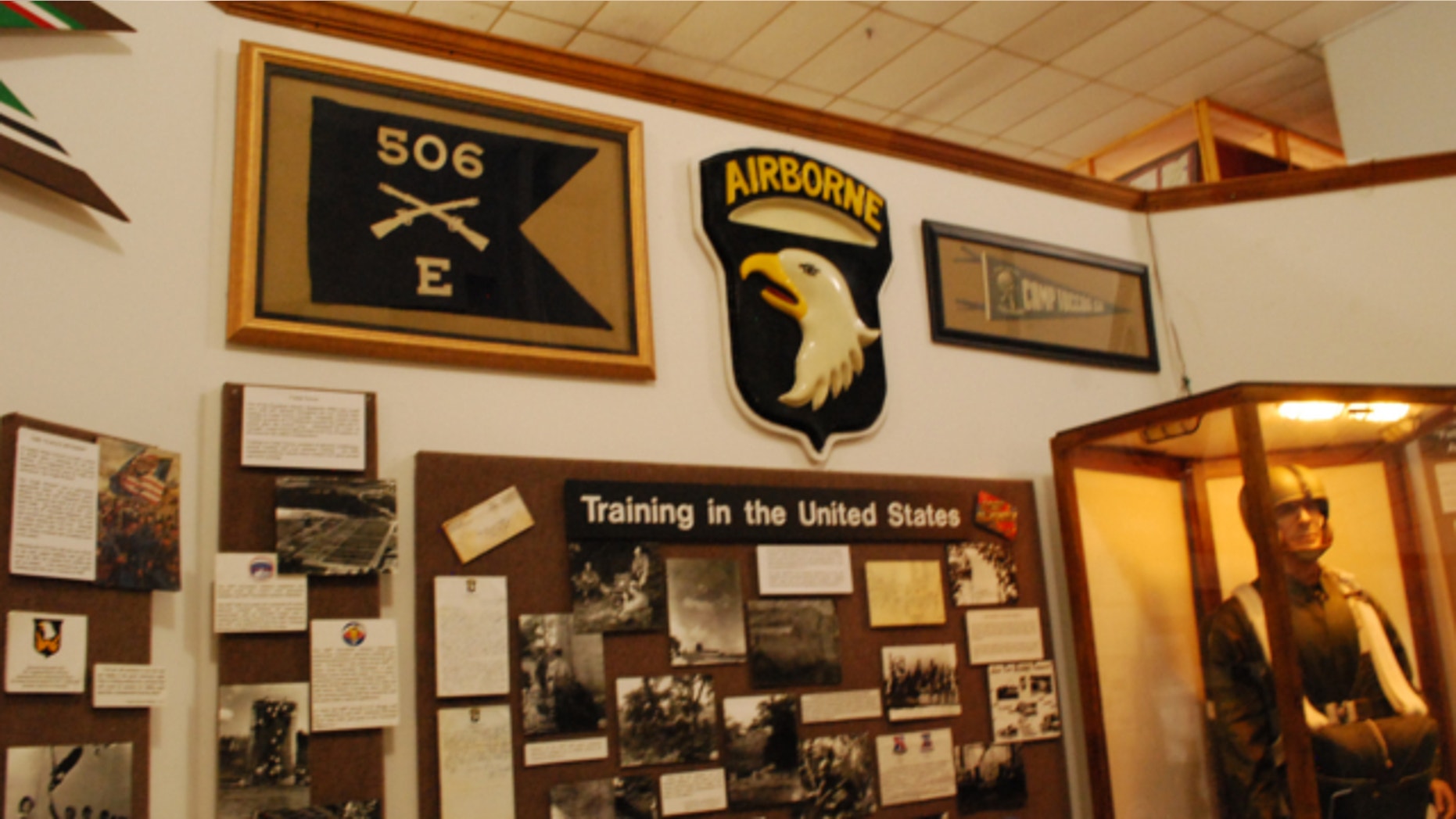 June 27, 2013: The flag of Easy Company, 506th Parachute Infantry Regiment, who were made famous as the "Band of Brothers" in World War II, is seen on a wall inside the museum at Fort Campbell, Ky.