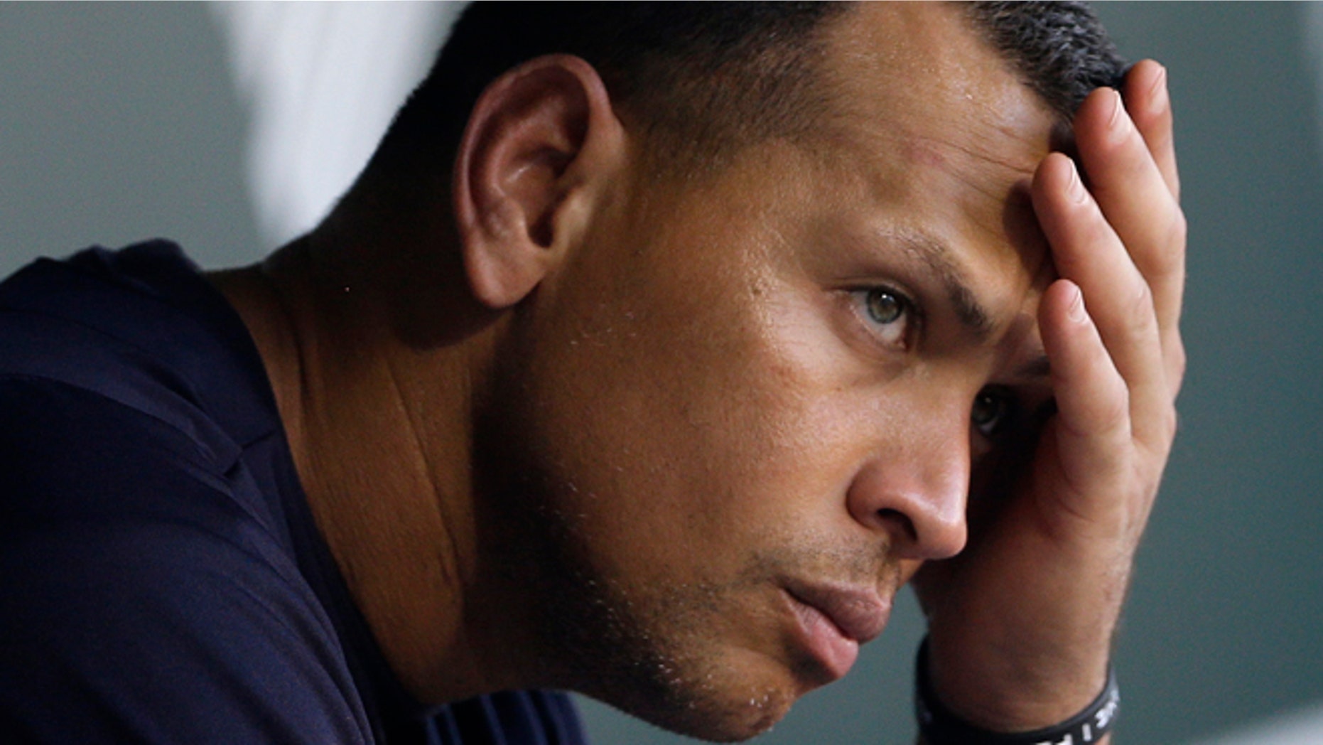 Sept. 11, 2013: New York Yankees' Alex Rodriguez wipes sweat from his brow as he sits in the dugout before a baseball game against the Baltimore Orioles in Baltimore.